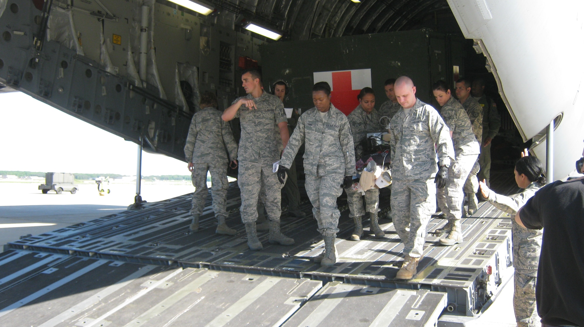 The 779th Medical Group Aeromedical Staging Facility (ASF) team consists of permanent party and deployed personnel from Air Force active duty, Air Force Reserve, and Air National Guard that care for our wounded warriors. (Photo by Melanie Moore, 79 MDW PA)