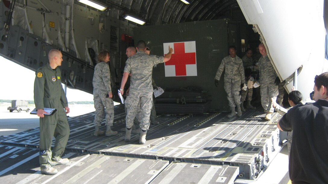 The 779th Medical Group Aeromedical Staging Facility (ASF) team consists of permanent party and deployed personnel from Air Force active duty, Air Force Reserve, and Air National Guard that care for our wounded warriors. (Photo by Melanie Moore, 79 MDW PA)