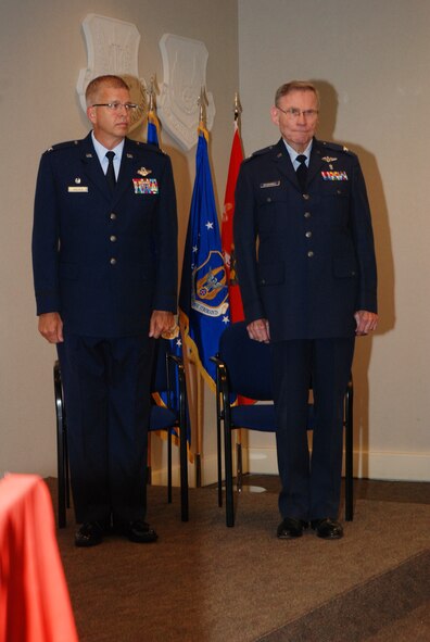 Col. Alfred W. Studwell stood with Col. Timothy E. Tarchick, Commander of the 94th Airlift Wing before accepting the Air Medal for meritorious achievement while participating in aerial flight during a ceremony that took place in the 22nd Air Force media center June 5. Colonel Studwell was the flight surgeon on board an urgent aeromedical airlift mission to and from Beirut, Lebanon on Oct. 23 1983. (U.S. Air Force photo/ Senior Airman Danielle Campbell) 

