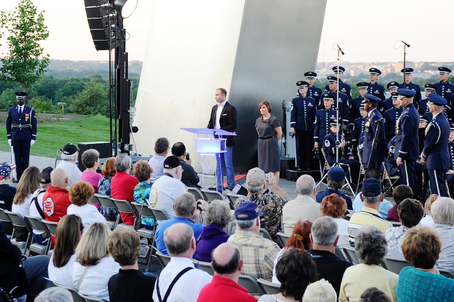 Wesley Whatley, director of the band program for Macy’s Day parade, and Amy Quell, executive producer of the Macy’s Day Parade, announce the invitation of the U.S. Air Force Band and the U.S. Air Force Honor Guard to the 2012 Macy’s Day Parade June 4, during the start of the USAF Band's summer concert series at the Air Force Memorial, Arlington, Va. The Macy’s Day Parade committee presented Maj. Gen. Darren W. McDew, Air Force District of Washington commander, Col. A. Phillip Waite, USAF Band commander, and Lt. Col. Raymond Powell, USAF Honor Guard commander with the official 2012 Macy’s Day Parade Drum Head in honor of the official invitation. (U.S. Air Force photo by Staff Sgt. Raymond Mills)