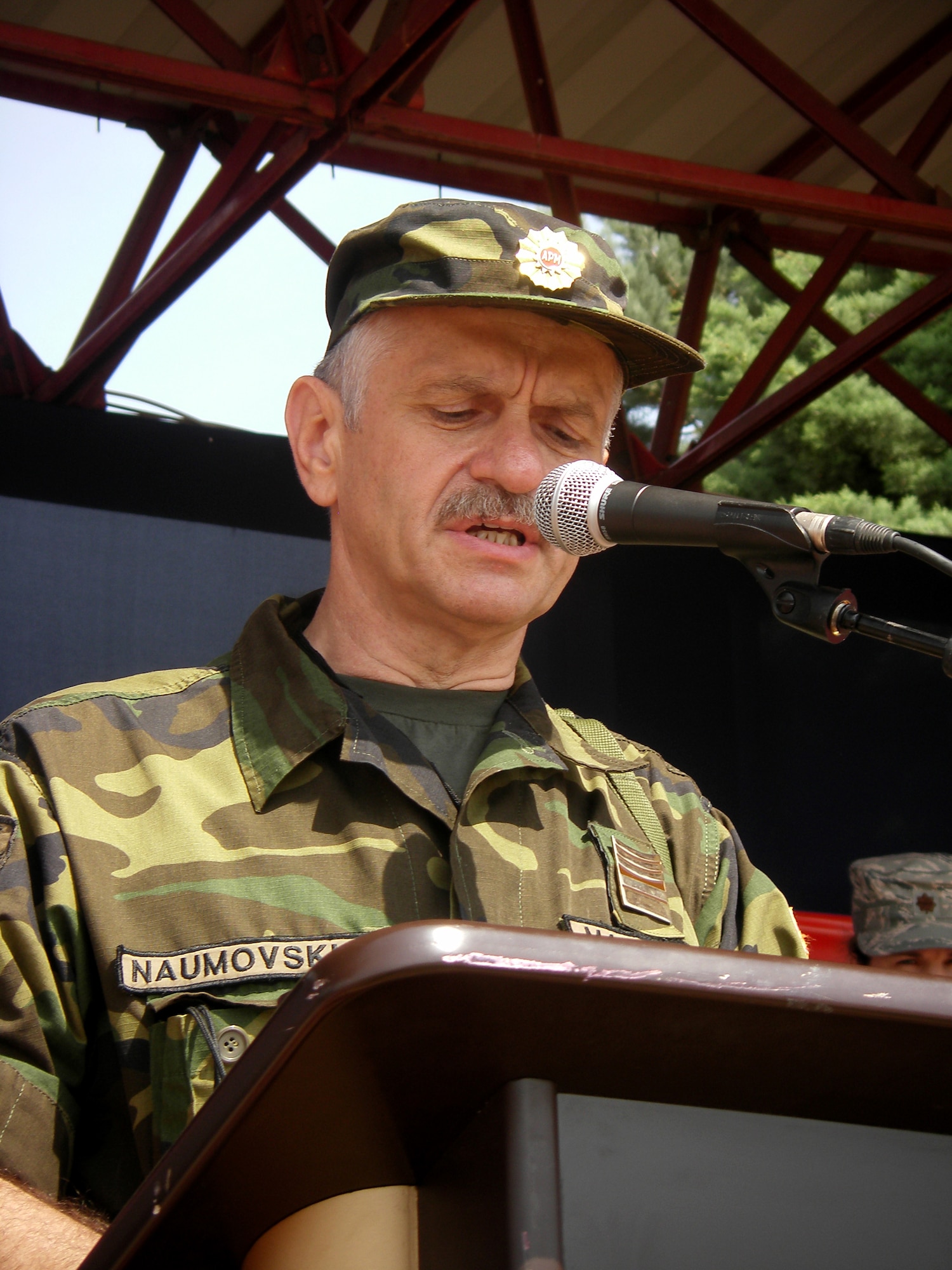 CAMP PEPELISHTE, Macedonia – Col. Andreja Naumovski, Macedonian co-director of Medical Training Exercise in Central and Eastern Europe, gives his opening remarks during the MEDCEUR 2011 opening ceremony here June 6.  The countries participating in this year’s MEDCEUR are Macedonia, Montenegro, Bosnia and Herzegovina, Serbia, Slovenia, Norway and the United States.  MEDCEUR is a Partnership for Peace and Chairman of the Joint Chiefs of Staff-sponsored regional and multilateral exercise in Central and Eastern Europe designed to provide medical training and operational experience in a deployed environment.  (U.S. Air Force photo/Master Sgt. Kelley J. Stewart)
