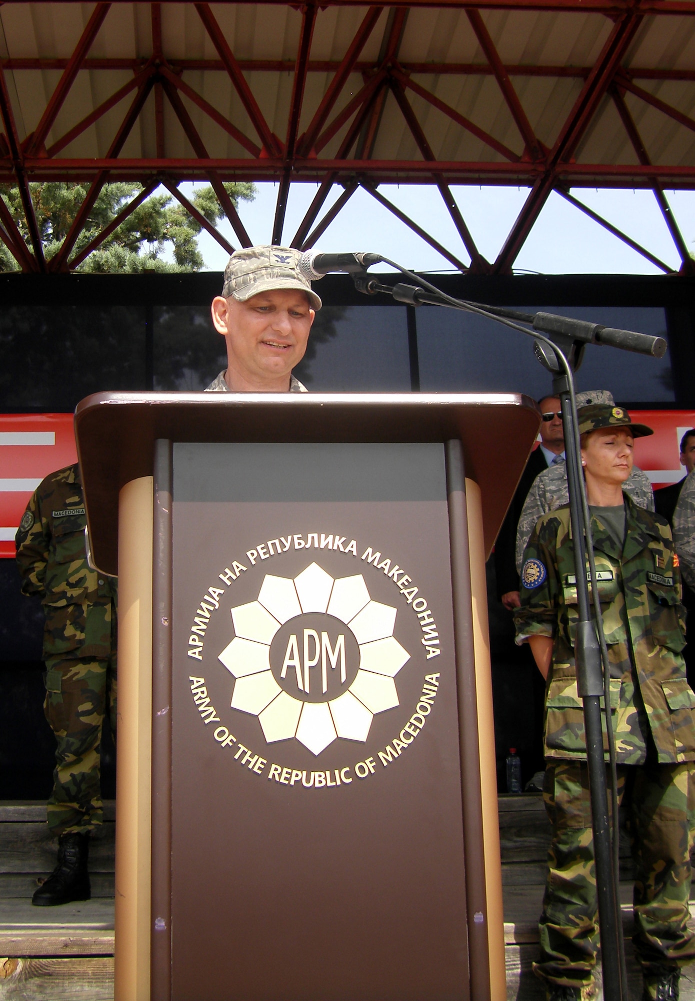 CAMP PEPELISHTE, Macedonia – Col. Charles Tedder, the American co-director for Medical Training Exercise in Central and Eastern Europe, gives his opening remarks during the MEDCEUR 2011 opening ceremony here June 6. The countries participating in this year’s MEDCEUR are Macedonia, Montenegro, Bosnia and Herzegovina, Serbia, Slovenia, Norway and the United States. MEDCEUR is a Partnership for Peace and Chairman of the Joint Chiefs of Staff-sponsored regional and multilateral exercise in Central and Eastern Europe designed to provide medical training and operational experience in a deployed environment.  (U.S. Air Force photo/Master Sgt. Kelley J. Stewart)