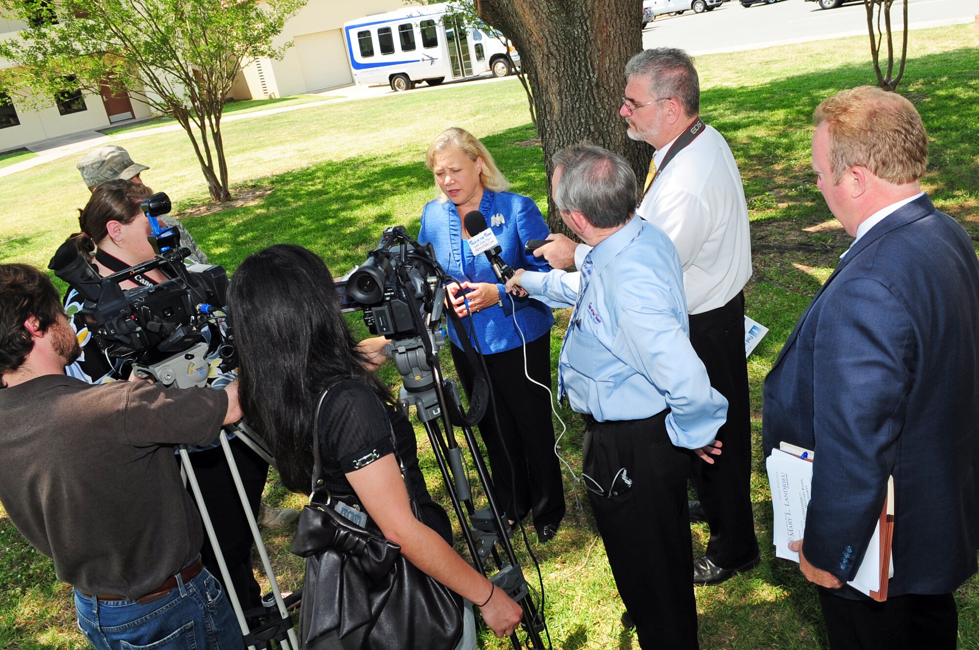 Members of the Shreveport and Bossier City press interview Sen. Mary Landrieu outside the Red River Dining Facility located on Barksdale Air Force Base, La., June 2. During her visit, Senator Landrieu focused on quality-of-life issues including enlisted dormitories, base housing, education and energy efficiency of base facilities. (U.S. Air Force photo/Senior Airman Joanna M. Kresge)