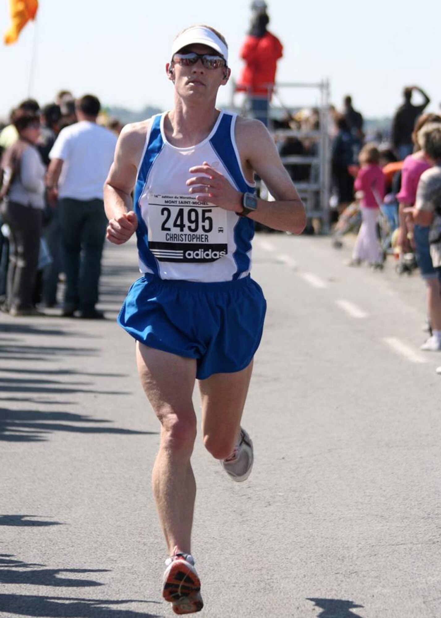 CANCALE, France -- Lt. Col. Chris Bennett, 100th Air Refueling Wing chief of safety, storms along during the Mont St. Michel marathon near Brittany and Normandy, France, May 29, 2011. This was Colonel Bennett's 24th marathon, and he finished in 2:57:20 -- his sixth marathon with a finish time of under three hours. Also competing with him in the marathon were Col. Chad Manske, 100th ARW commander; Lt. Col. Don Robertson, 100th Security Forces Squadron commander, and Lt. Col. Matt Greene, 100th Civil Engineer Squadron commander. (Courtesy photo by Molly Bennett)  
