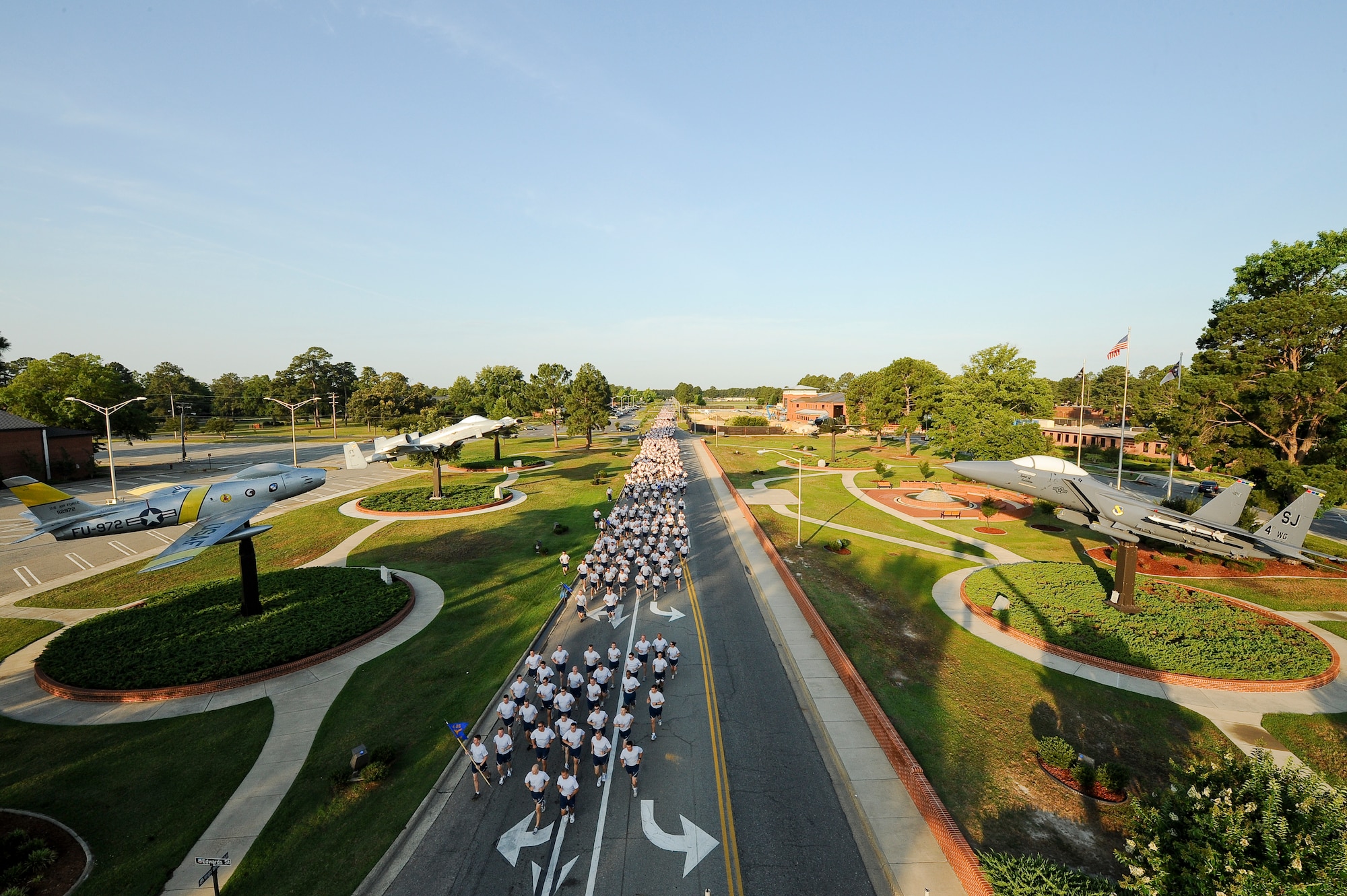 SEYMOUR JOHNSON AIR FORCE BASE, N.C. - Airmen from the 4th Fighter Wing run down Wright Brothers Avenue here June 3, 2011. The wing run route was approximately 1.5 miles and kicked off Wing Sports Day, a day designed to boost morale and team work. Col. Patrick Doherty, 4th Fighter Wing commander held Wing Sports Day to kick off the Critical Days of Summer. (U.S. Air Force photo/Tech. Sgt. Colette M. Graham)(RELEASED)