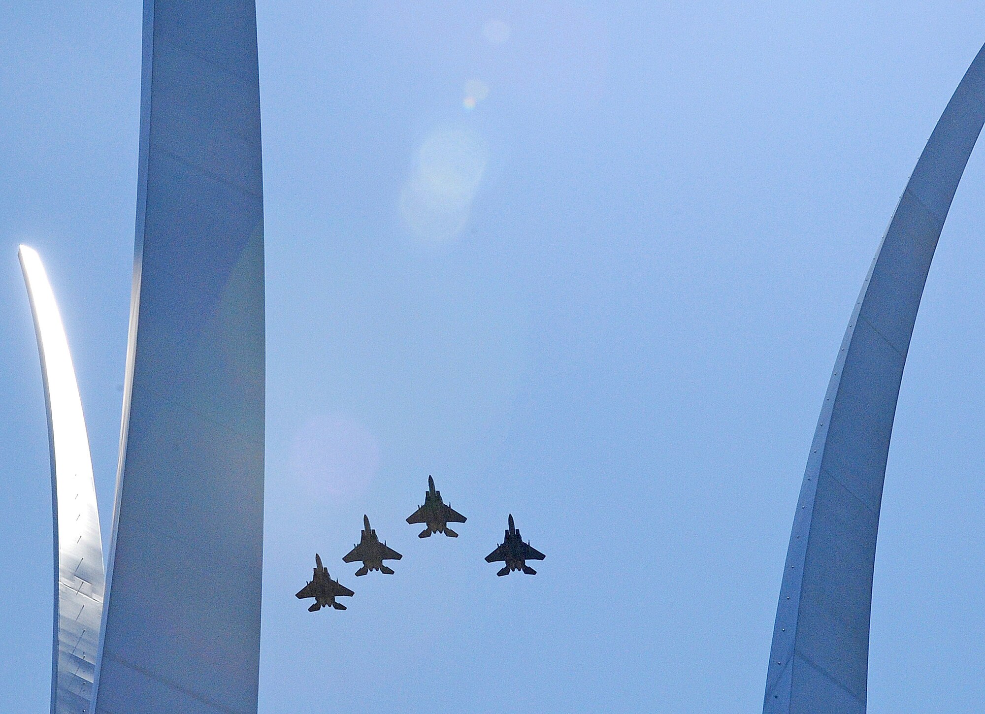 Four F-15E Strike Eagles fly June 2, 2011, above the Air Force Memorial in Arlington, Va., following the 4th Fighter Wing's acceptance of the inaugural Doolittle Award. The Air Force Historical Foundation's new distinction acknowledges sustained, distinctive contributions to the history and heritage of the U.S. Air Force, and is named after aviation pioneer James H. Doolittle, who served as a lieutenant general in the United States Army Air Forces during World War II and received the Medal of Honor for valor and leadership as commander of the famous Doolittle Raid. (U.S. Air Force photo/Senior Airman Gino Reyes)