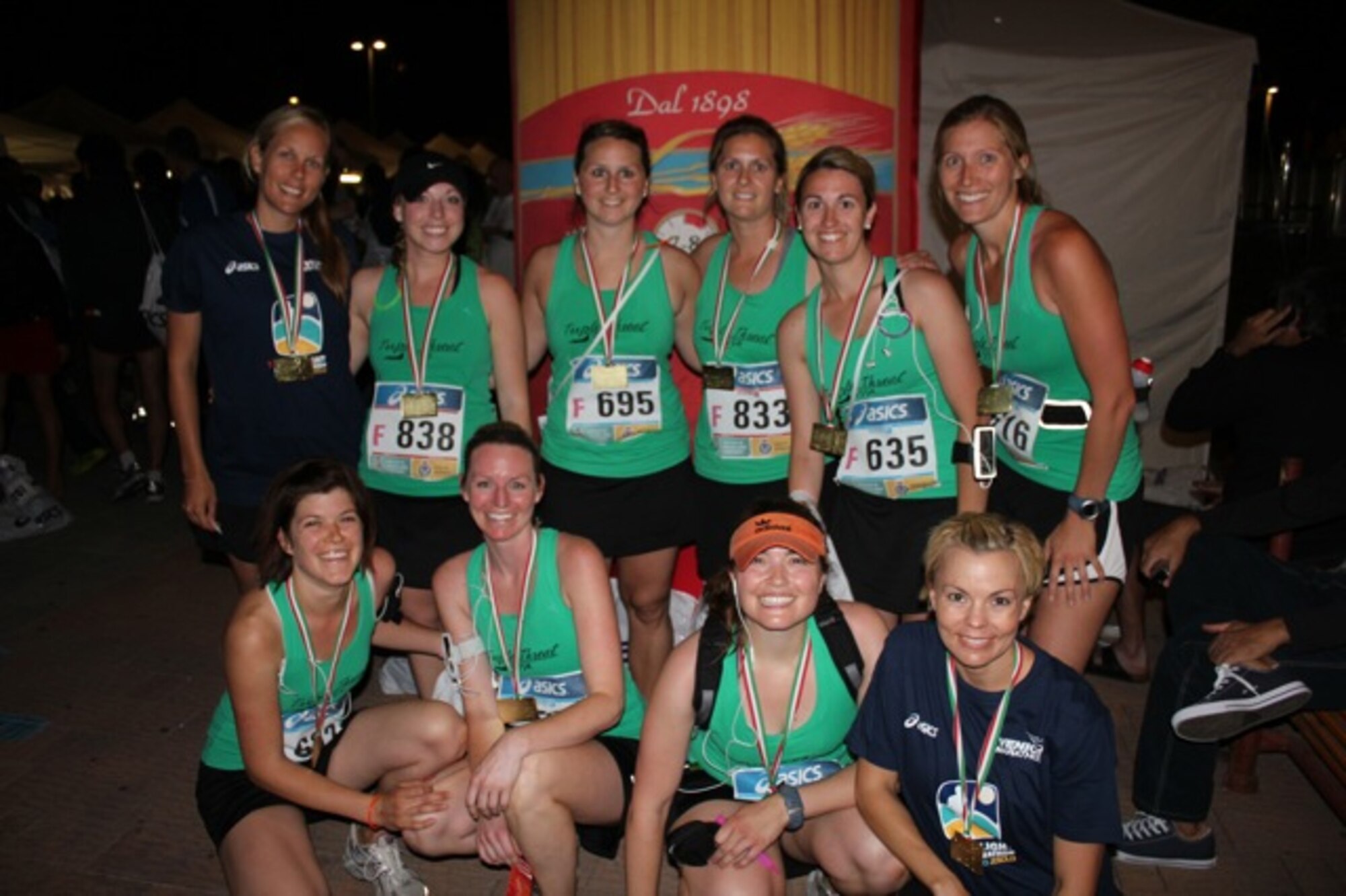 A group of 555th Fighter Squadron pilots' spouses poses for a photo after completing the first Moonlight Half Marathon May 21 in Jesolo, Italy. (Courtesy photo)