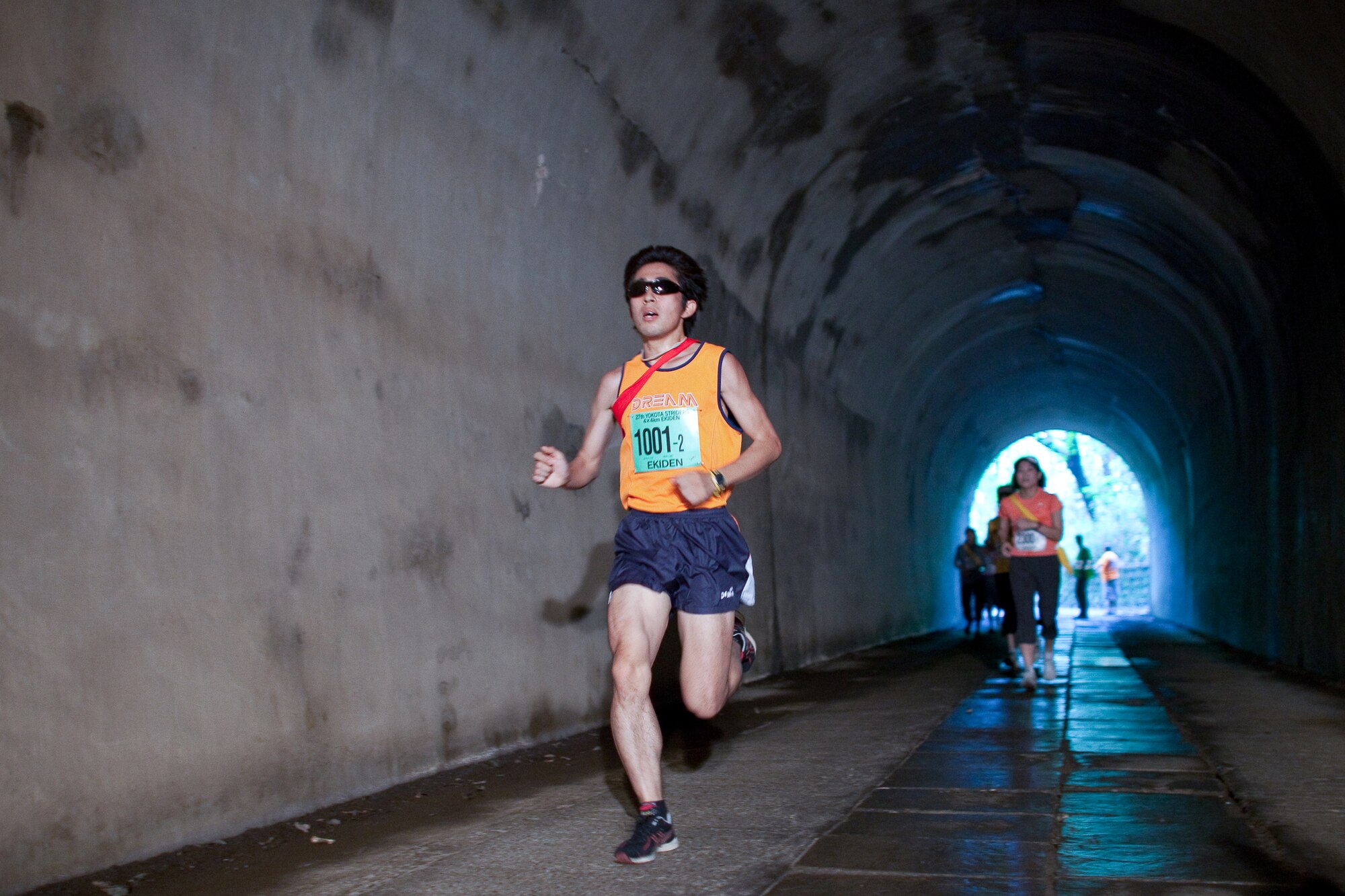 INAGI CITY, Japan -- The Yokota Striders Running Club sponsored the 27th Yokota Ekiden at the Tama Hills Recreation Area June 5, 2011. This is the first time the race was hosted at Tama Hills. More than 4,000 runners participated in the 2K kid's run, the 5K run, and the 4x4 kilometer Ekiden relay main event. Koutarou Yoshida and his team received first place of 4x4km Ekiden, finishing with a time of 0:52:27. (U.S. Air Force photo/Osakabe Yasuo)