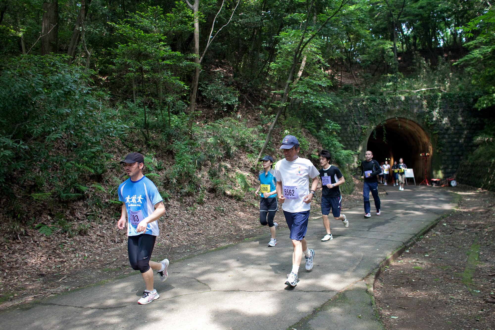 INAGI CITY, Japan -- The Yokota Striders Running Club sponsored the 27th Yokota Ekiden at the Tama Hills Recreation Area June 5, 2011. This is the first time the race was hosted at Tama Hills and more than 4,000 runners participated in the 2K kid's run, the 5K run, and the 4x4 kilometer Ekiden relay main event. (U.S. Air Force photo/Osakabe Yasuo)