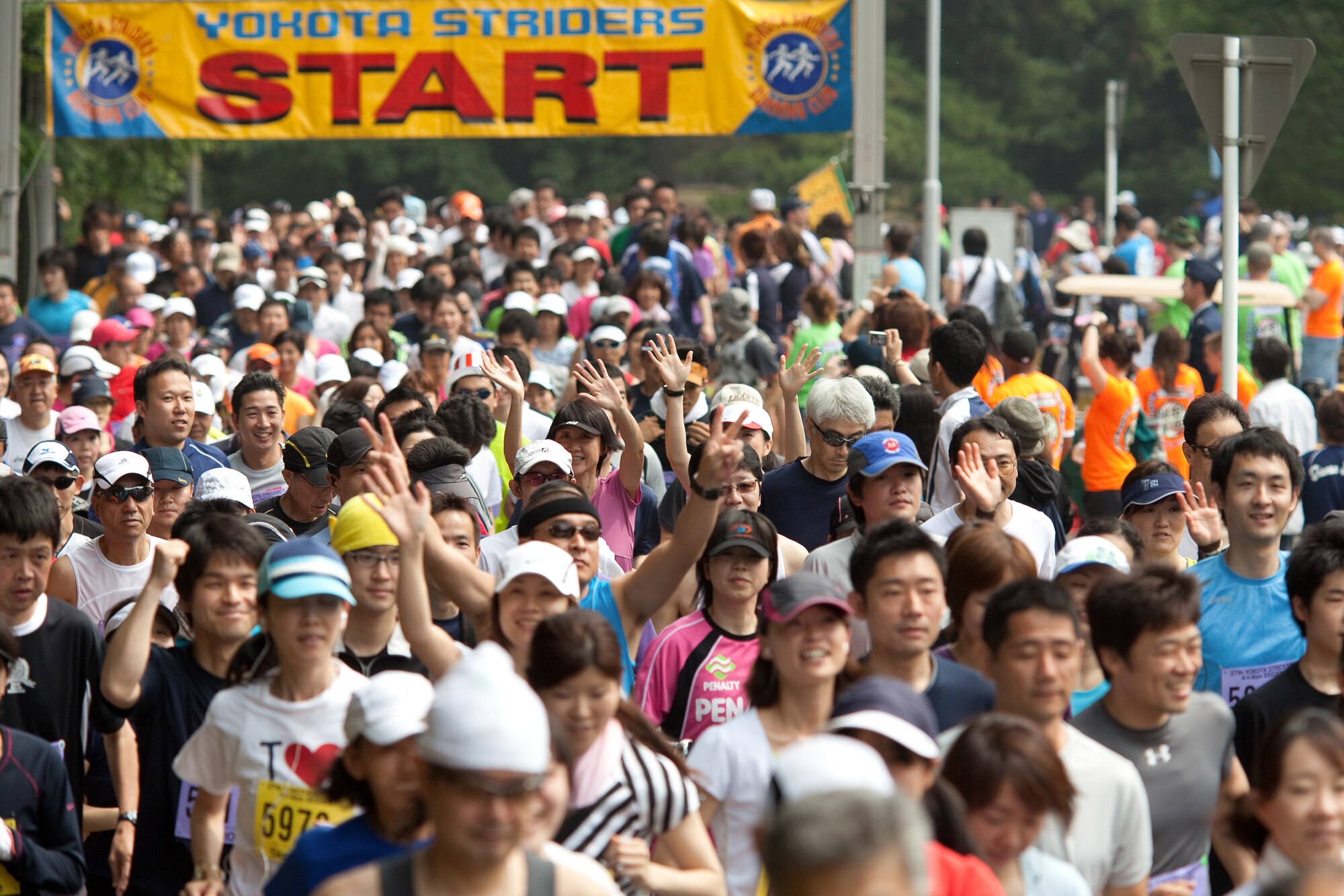 INAGI CITY, Japan -- The Yokota Striders Running Club sponsored the 27th Yokota Ekiden at the Tama Hills Recreation Area June 5, 2011. This is the first time the race was hosted at Tama Hills and more than 4,000 runners participated in the 2K kid's run, the 5K, and the 4x4 kilometer Ekiden relay main event. (U.S. Air Force photo/Osakabe Yasuo)