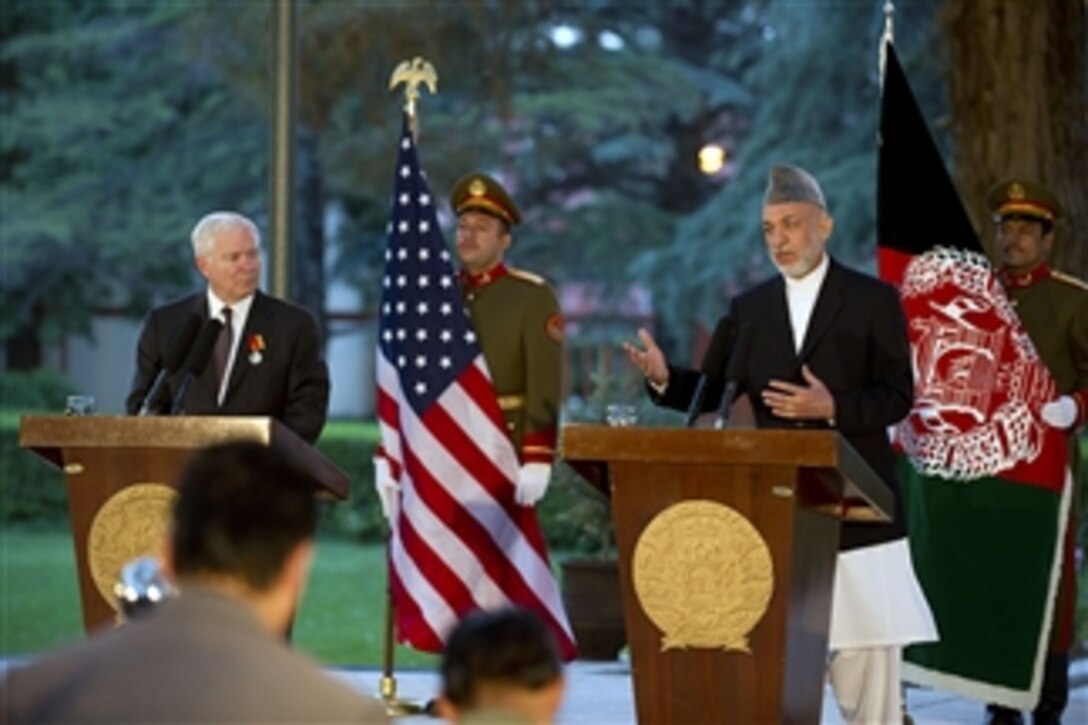 Secretary of Defense Robert M. Gates and President of Afghanistan Hamid Karzai conduct a press conference in Kabul, Afghanistan, on June 4, 2011.  