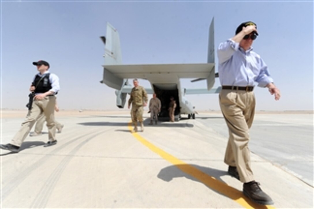 Secretary of Defense Robert M. Gates exits a V-22 Osprey at a Forward Operating Base in Afghanistan on June 5, 2011.  