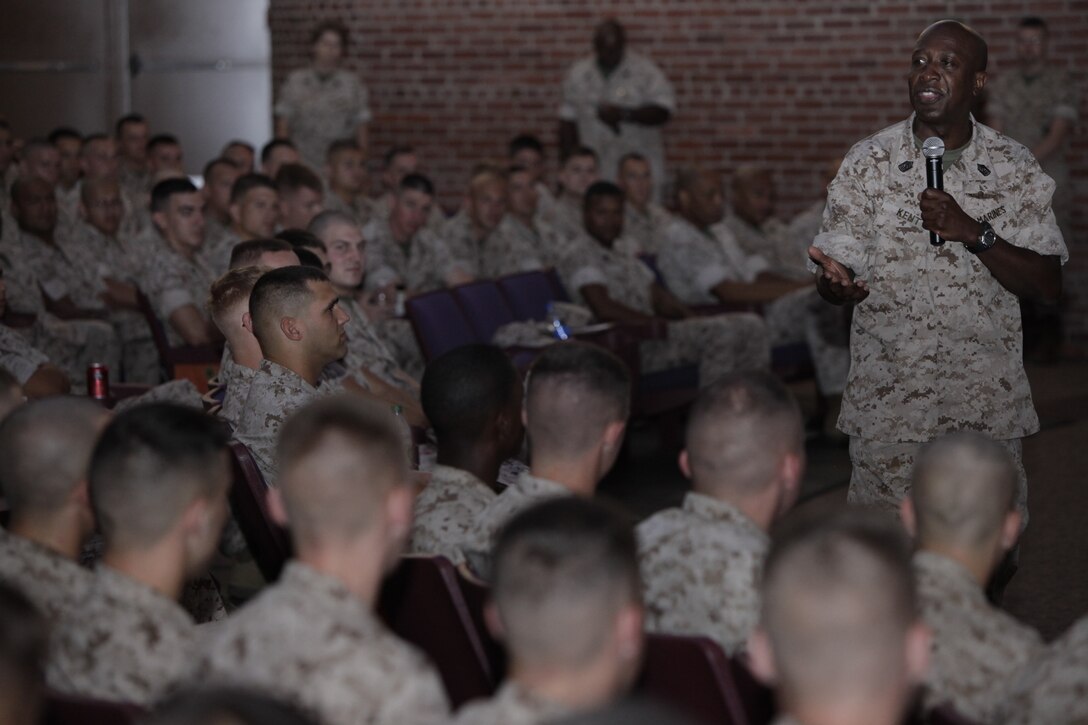Sgt. Maj. Carlton W. Kent, 16th sergeant major of the Marine Corps, converses with more than 1,700 Marines and Sailors at the Cherry Point Theater June 7. Kent is slated to give up his post as sergeant major of the Marine Corps to Sgt. Maj. Micheal P. Barrett during a post and relief ceremony at Marine Barracks Washington in Washington, D.C., June 9. “I never thought I would be the Sergeant Major of the Marine Corps,” Kent said. “All I can say is don’t worry about your next rank because as long as you take care of Marines, Marines are going to take care of you.”