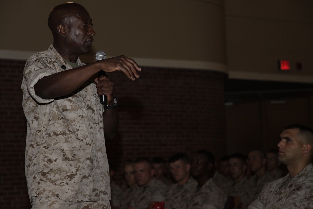 Sgt. Maj. Carlton W. Kent, 16th sergeant major of the Marine Corps, converses with more than 1,700 Marines and Sailors at the Cherry Point Theater June 7. Kent is slated to give up his post as sergeant major of the Marine Corps to Sgt. Maj. Micheal P. Barrett during a post and relief ceremony at Marine Barracks Washington in Washington, D.C., June 9. “My whole adult life I’ve been a Marine, and all I know are you fellow warriors,” he stated. “I can tell you; I’m leaving the Marine Corps with a sense of pride, knowing the Marine Corps legacy will continue because of great warriors like you.”