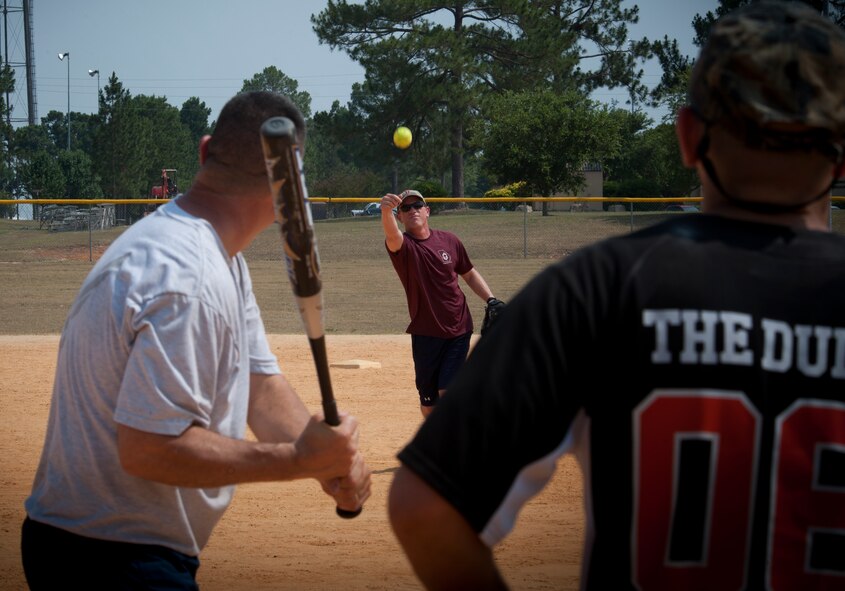 Chief Master Sgt. Frank Batten, 23rd Wing command chief, pitches the softball to a fellow Chief during the Chiefs vs. Eagles softball game June 3, at Moody Air Force Base Ga. During the game, team members pitched to members of their own team. (U.S. Air Force photo/Airman 1st Class Jarrod Grammel)(RELEASED)