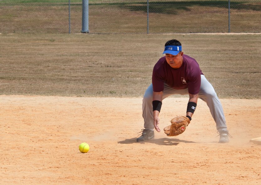 Chief Master Sgt. Joseph Pritchard, 23rd Security Forces Squadron security forces manager, waits for a ground ball during the Chiefs vs. Eagles softball game June 3, at Moody Air Force Base Ga.  The Chiefs won the first of three games 4-1. (U.S. Air Force photo/Airman 1st Class Jarrod Grammel)(RELEASED)
