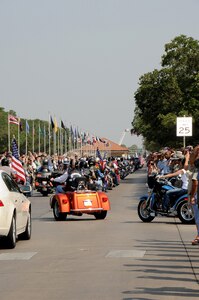 Members of the local chapter of the Patriot Guard were part of the processional transporting the remains of Army Sgt. Thomas A. Bohall, of Bel Aire, Kan., down Harmon Drive at Randolph Air Force Base, Texas, June 7. Sergeant Bohall was assigned to the 4th Battalion, 101st Aviation Regiment, 159th Combat Aviation Brigade, 101st Airborne Division (Air Assault), Fort Campbell, Ky. Sergeant Bohall was one of six soldiers from Fort Campbell who were supporting Operation Enduring Freedom and killed by an improvised explosive device during an insurgent attack May 26, 2011 in Kandahar province, Afghanistan. (U.S. Air Force photo/Melissa Peterson)