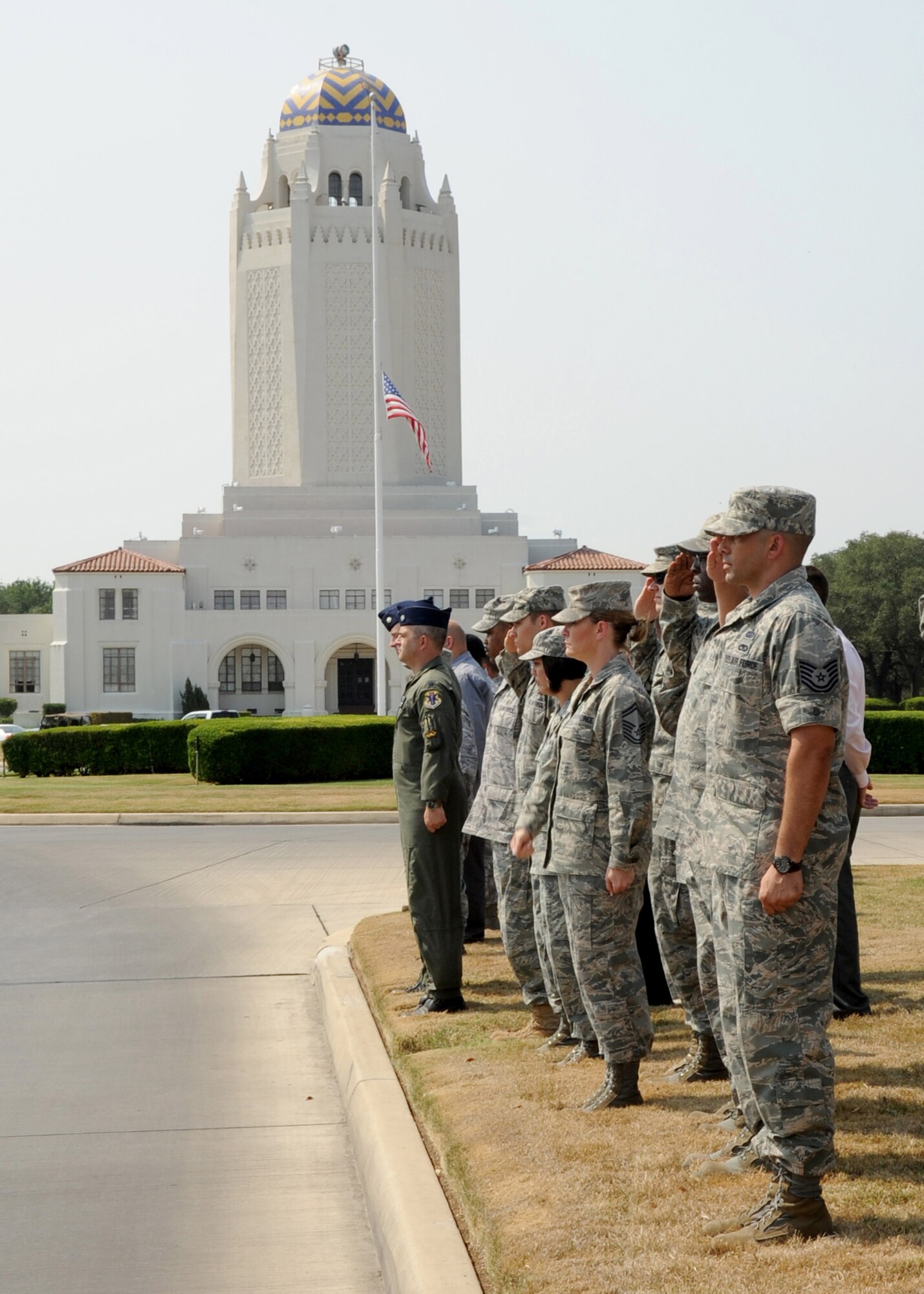 A crowd gathers as a motorcade processional transporting the remains of Army Sgt. Thomas A. Bohall, of Bel Aire, Kan., travels down Harmon Drive at Randolph Air Force Base, Texas, June 7. Bohall was assigned to the 4th Battalion, 101st Aviation Regiment, 159th Combat Aviation Brigade, 101st Airborne Division (Air Assault), Fort Campbell, Ky. Sergeant Bohall was one of six soldiers from Fort Campbell who were supporting Operation Enduring Freedom and killed by an improvised explosive device during an insurgent attack May 26, 2011 in Kandahar province, Afghanistan.  (U.S. Air Force photo/Melissa Peterson)
