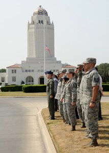 A crowd gathers as a motorcade processional transporting the remains of Army Sgt. Thomas A. Bohall, of Bel Aire, Kan., travels down Harmon Drive at Randolph Air Force Base, Texas, June 7. Bohall was assigned to the 4th Battalion, 101st Aviation Regiment, 159th Combat Aviation Brigade, 101st Airborne Division (Air Assault), Fort Campbell, Ky. Sergeant Bohall was one of six soldiers from Fort Campbell who were supporting Operation Enduring Freedom and killed by an improvised explosive device during an insurgent attack May 26, 2011 in Kandahar province, Afghanistan.  (U.S. Air Force photo/Melissa Peterson)