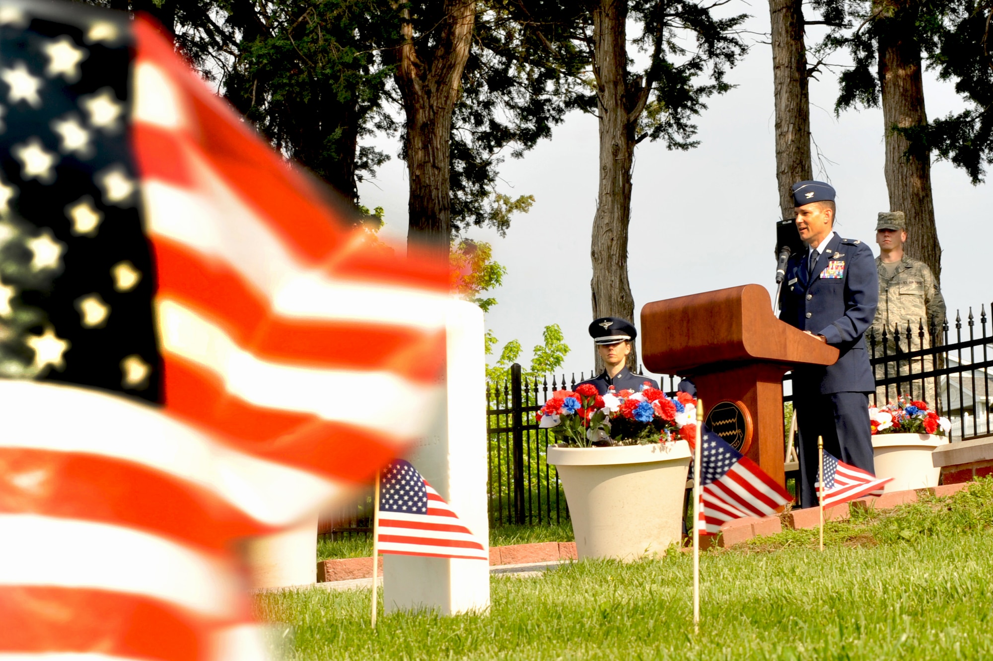 OFFUTT AIR FORCE BASE, Neb. - Col. William P. Jensen, 55th Wing vice commander, speaks to members of the Offutt community at the annual Memorial Day service held at the Offutt Air Force Base cemetery May 30th. The Memorial Day service is held annually to honor veterans from all eras who have served our nation. 
Air Force Photo by D.P. Heard 
