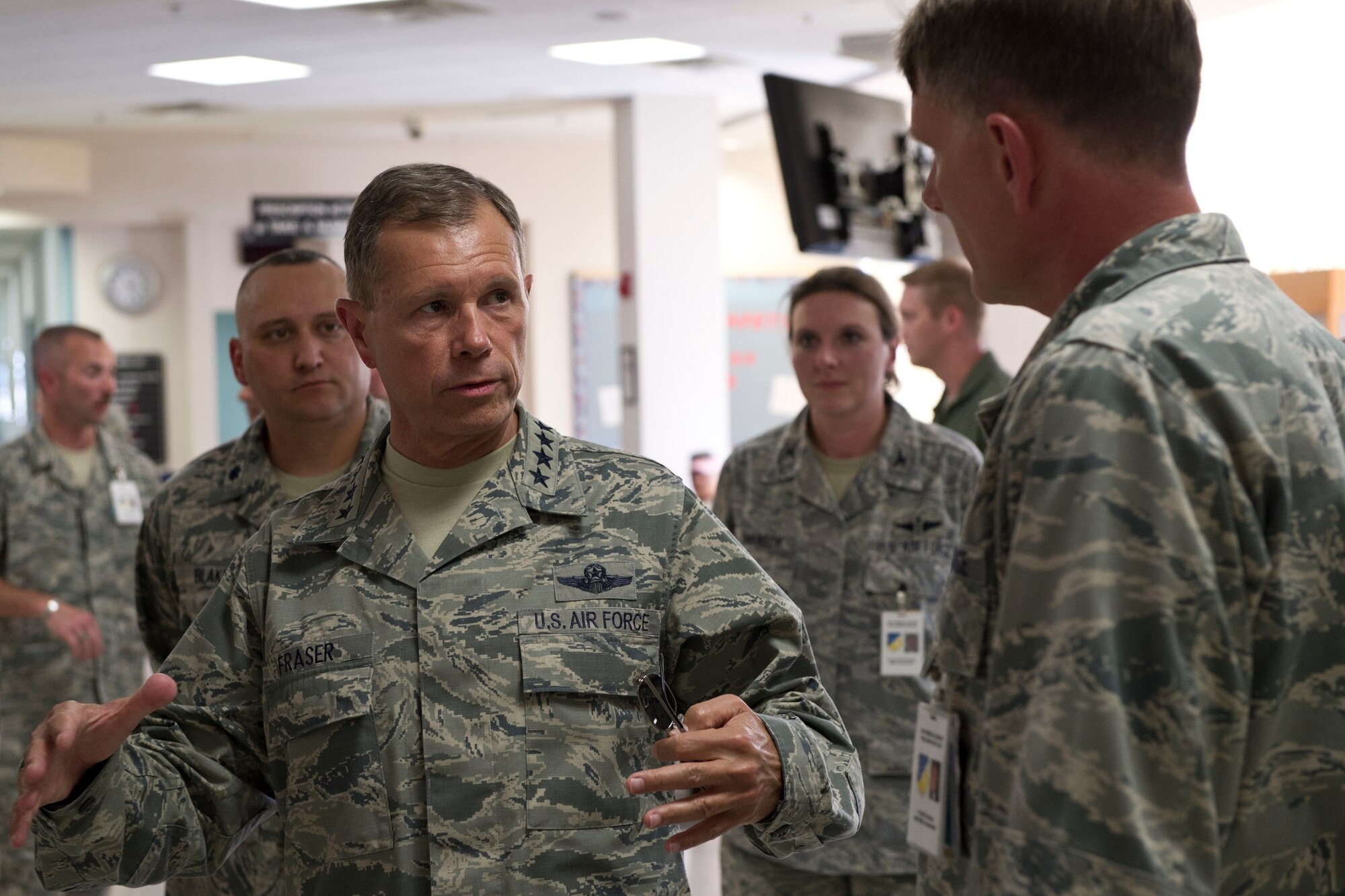 HOLLOMAN AIR FORCE BASE, N.M. -- Gen. William M. Fraser III, commander of Air Combat Command, speaks with Col. William Thomas, 49th Medical Group commander, June 1, 2011, at the base clinic. The 49 MDG staff gave General Fraser an overview of the group’s history, statistics and plans of future construction. (U.S. Air Force photo by Airman 1st Class Joshua Turner/Released)