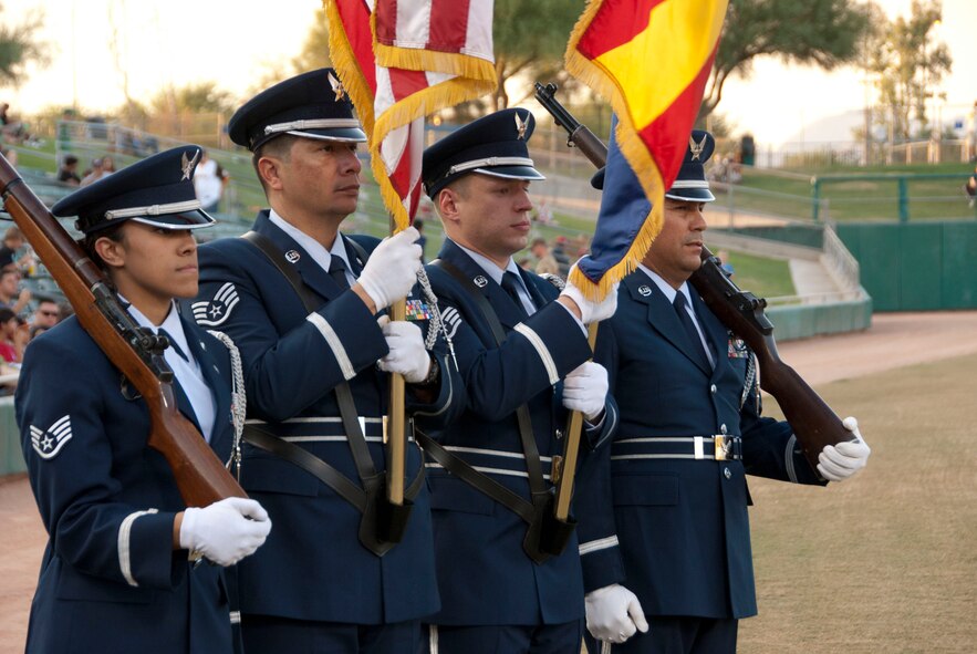 The 162nd Fighter Wing Honor Guard presents the colors at Kino Memorial Stadium June 5. (U.S. Air Force photo/Master Sgt. Dave Neve)