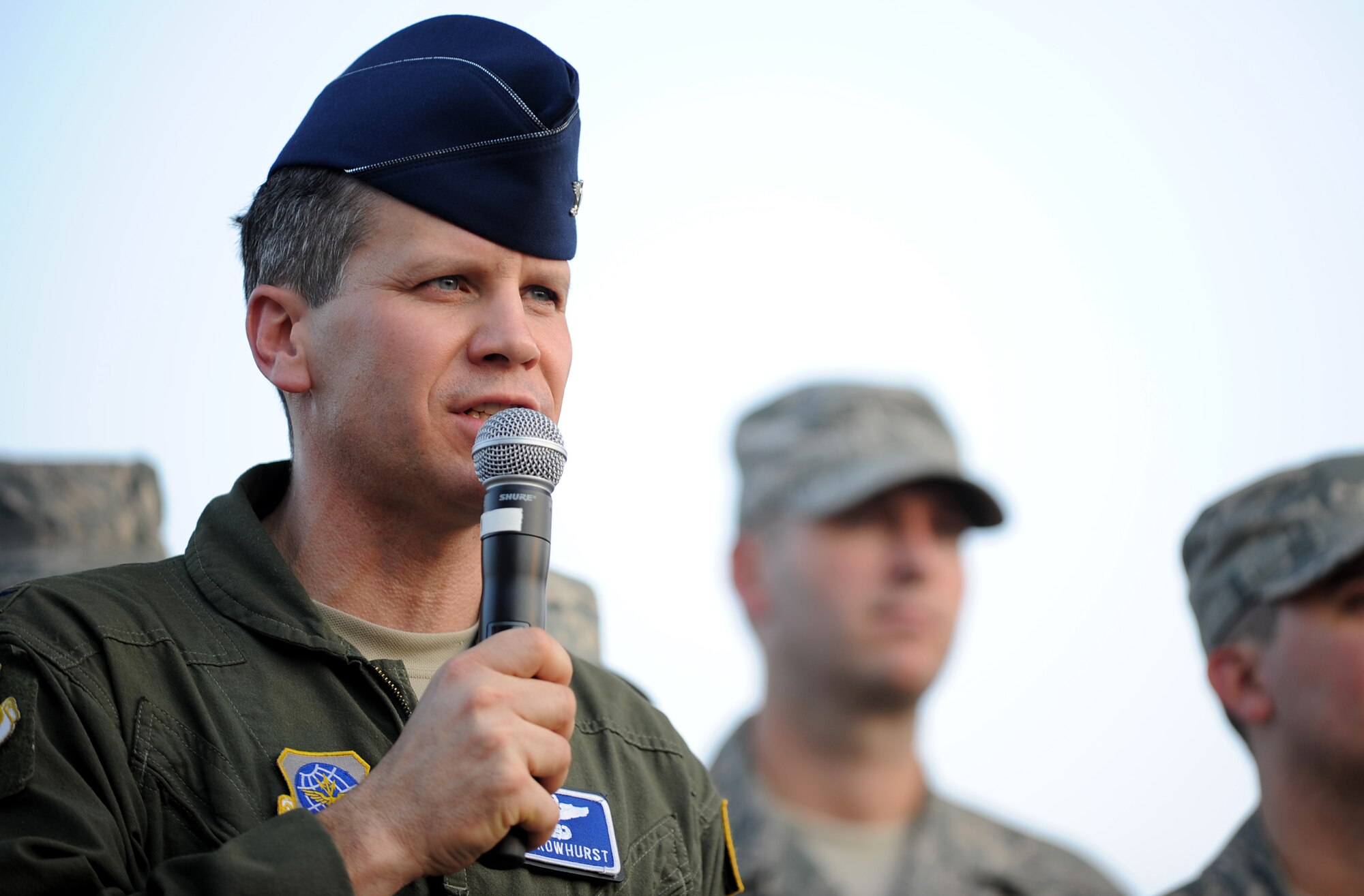 Col. Jamie Crowhurst, 22nd Air Refueling Wing commander, stands with Airmen returned from deployerments while speaking at the 2011 Wichita River Festival June 3, 2011, Wichita, Kan. The annual RiverFest, held this year June 3 through June 11, is used to build community pride and bring people together to focus on Wichita’s natural resource, the Arkansas River.  Team McConnell members annually participate in the festival by marching in the Sundown Parade. (U.S. Air Force Photo/Airman 1st Class Katrina M. Brisbin)