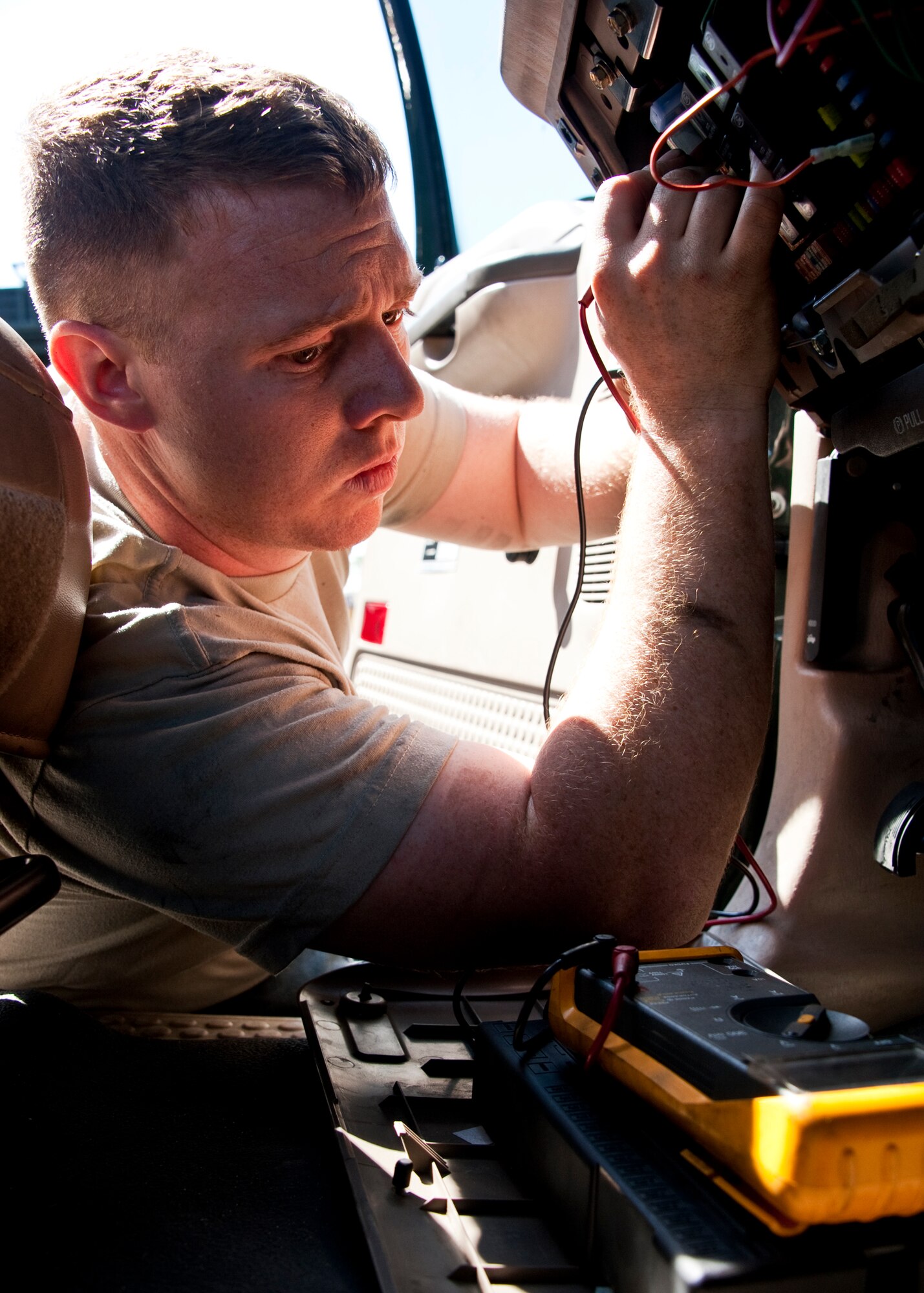 Staff Sgt. Jason Singer, 96th Vehicle Management Flight, tests the voltage on a flightline vehicle during an annual nuclear surety inspection.  Any vehicle that operates or moves weaponry is subject to a thorough serviceability inspection to ensure it meets all manufacturer specifications.  Nuclear sustainment is one of the top priorities of Air Force Materiel Command Commander, Gen. Donald Hoffman.   (U.S. Air Force photo/Samuel King Jr.)
