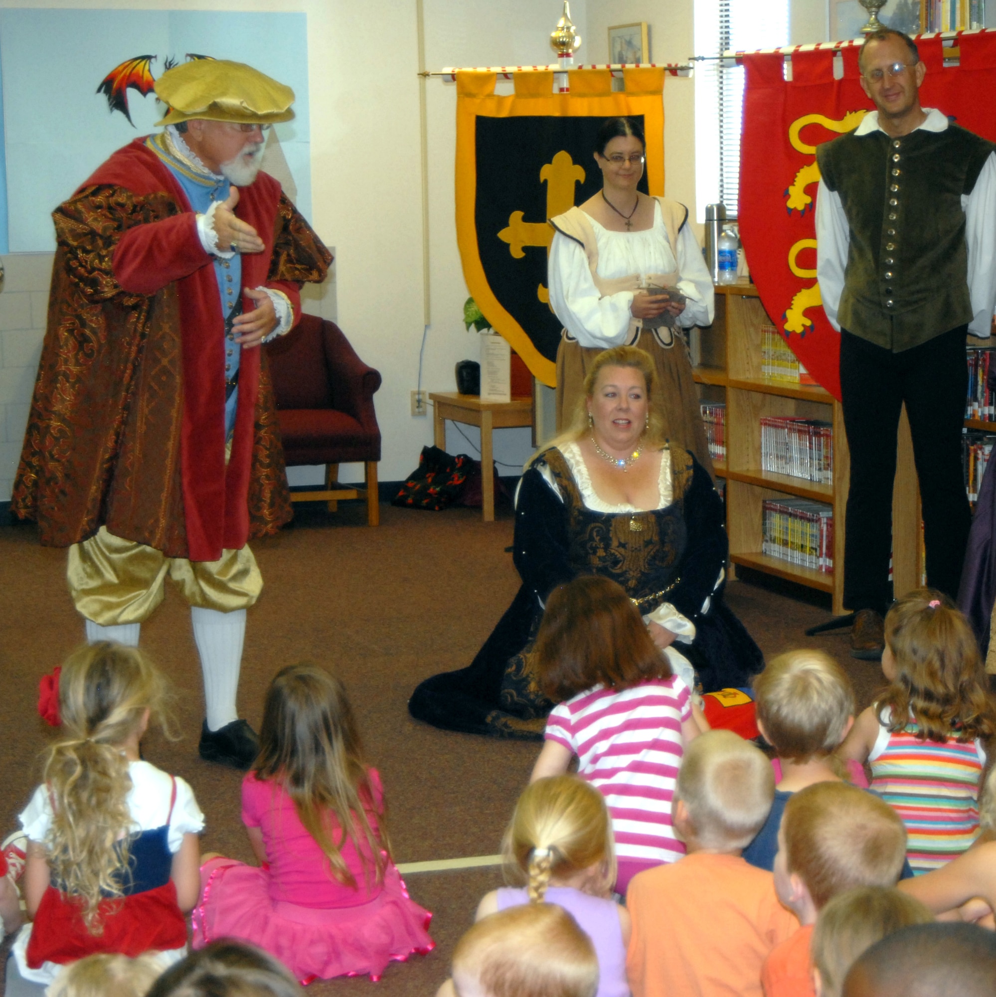 GOODFELLOW AIR FORCE BASE, Texas—Members of the San Angelo Renaissance Guild, a local organization dedicated to studying the Renaissance Era and performing free re-enactments through- out San Angelo, lecture Team Goodfellow youth about how different life was in those days. The event, which took place June 1, was part of the 2011 Midsummer Knight’s Read, a free children’s summer reading program offered at the base library. (U.S. Air Force photo/Airman 1st Class Jessica Keith) 