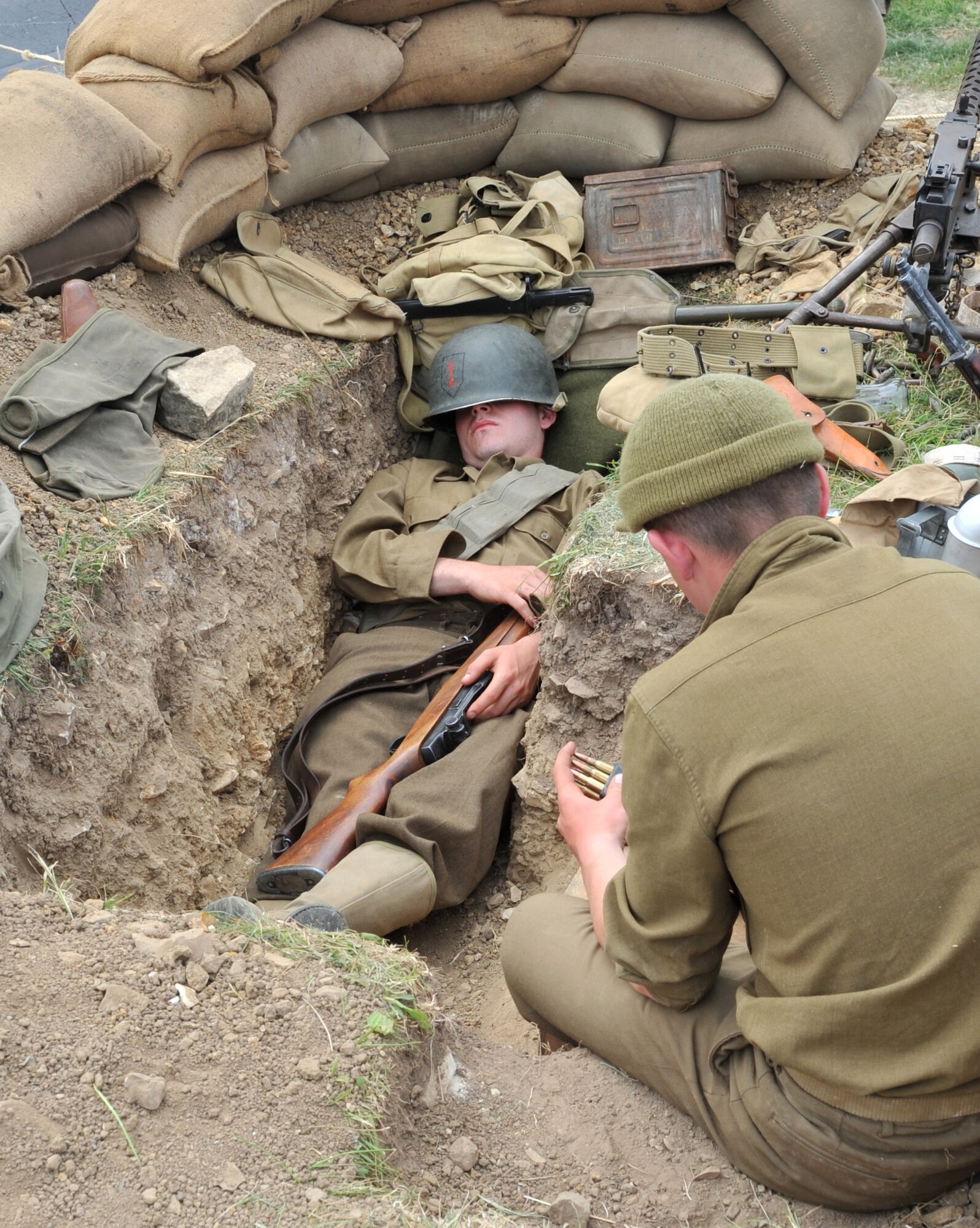 Re-enactors demonstrate operations in simulated field conditions on Omaha Beach, France, for the 67th Anniversary of the D-Day June 4, 2011.  Each year since the liberation of Normandy, U.S. forces and their allies honor those who gave the ultimate sacrifice on that day. This year's ceremony is scheduled to be attended by dozens of American World War II veterans. (U.S. Air Force photo by Senior Airman Caleb Pierce)  