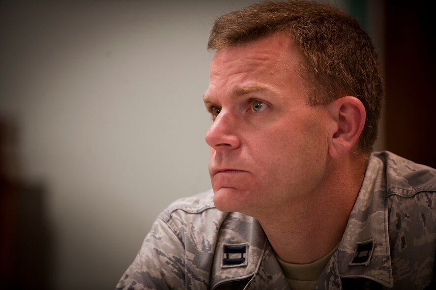 MOODY AIR FORCE BASE, Ga.-- Capt. Scott Brown, 23rd Medical Group medical logistics flight commander, listens to a deployment discussion during a Caring for People forum held June 2. The groups came up with solutions to the problems in order to solve the issues on base. (U.S. Air Force photo/Senior Airman Benjamin Wiseman)(RELEASED)