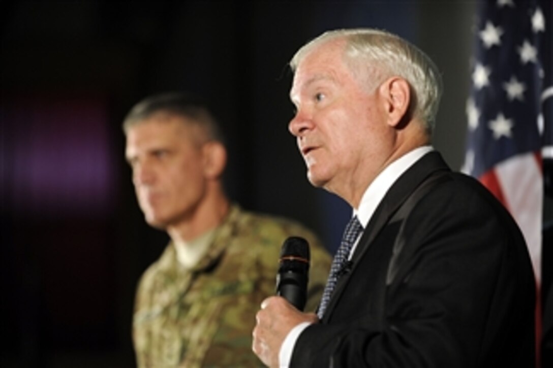 Secretary of Defense Robert M. Gates thanks the IJC troops for their service at the Joint Operations Center while the Commander of International Security Assistance Force Joint Command Lt. Gen. David M. Rodriguez looks on in Kabul, Afghanistan, on June 7, 2011.  