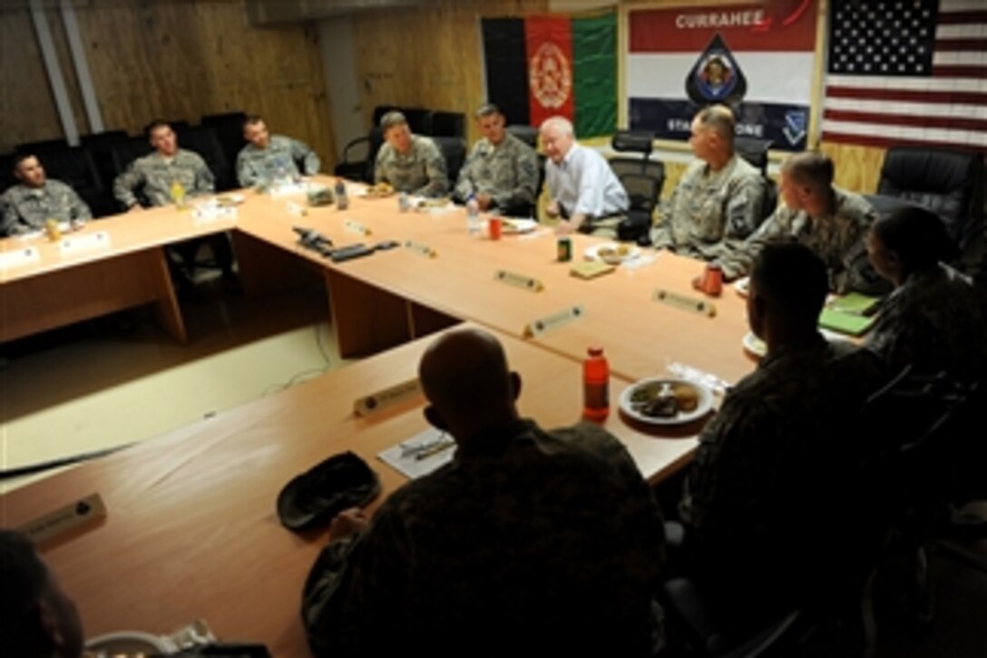 Secretary of Defense Robert M. Gates eats lunch with the company grade officers of Task Force Currahee at a Forward Operating Base in Afghanistan on June 6, 2011.  