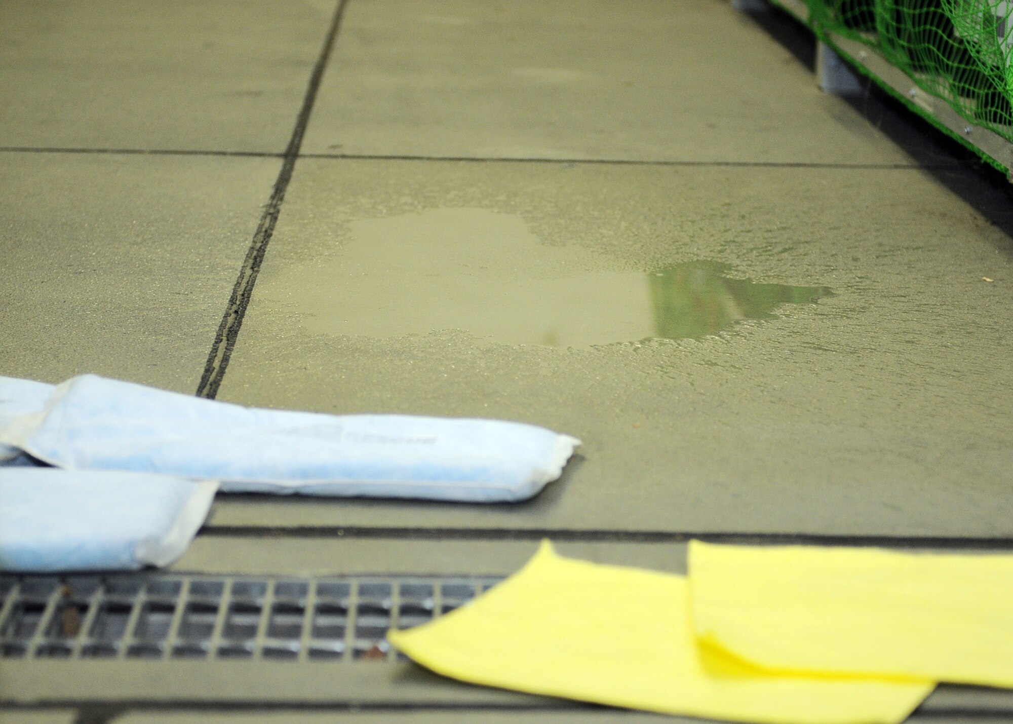 YOKOTA AIR BASE, Japan -- A simulated hazardous material spill is used as a scenario during the Initial Readiness Response Exercise at Yokota Air Base, Japan, June 8, 2011. Exercises provide structured scenarios that give Yokota personnel the opportunity to follow proper procedures and test their skills. (U.S. Air Force photo/Senior Airman Andrea Salazar)