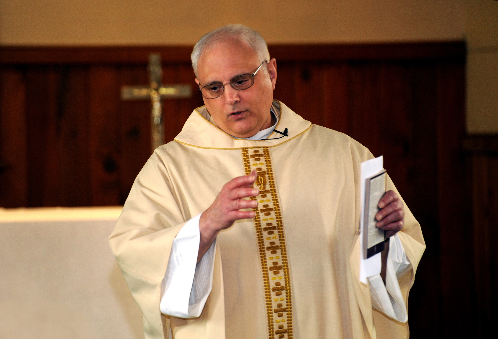 U.S. Air Force Lt. Col. Rick Sirianni delivers the Benediction during his final mass on May 15, 2011 at the Portland Air National Guard Base Chapel, Portland, Ore. Father Sirianni is retiring from the Oregon Air National Guard after 23 years of service as a Chaplain for the Oregon National Guard. (U.S. Air Force Photograph by Tech. Sgt. John Hughel) (Released)