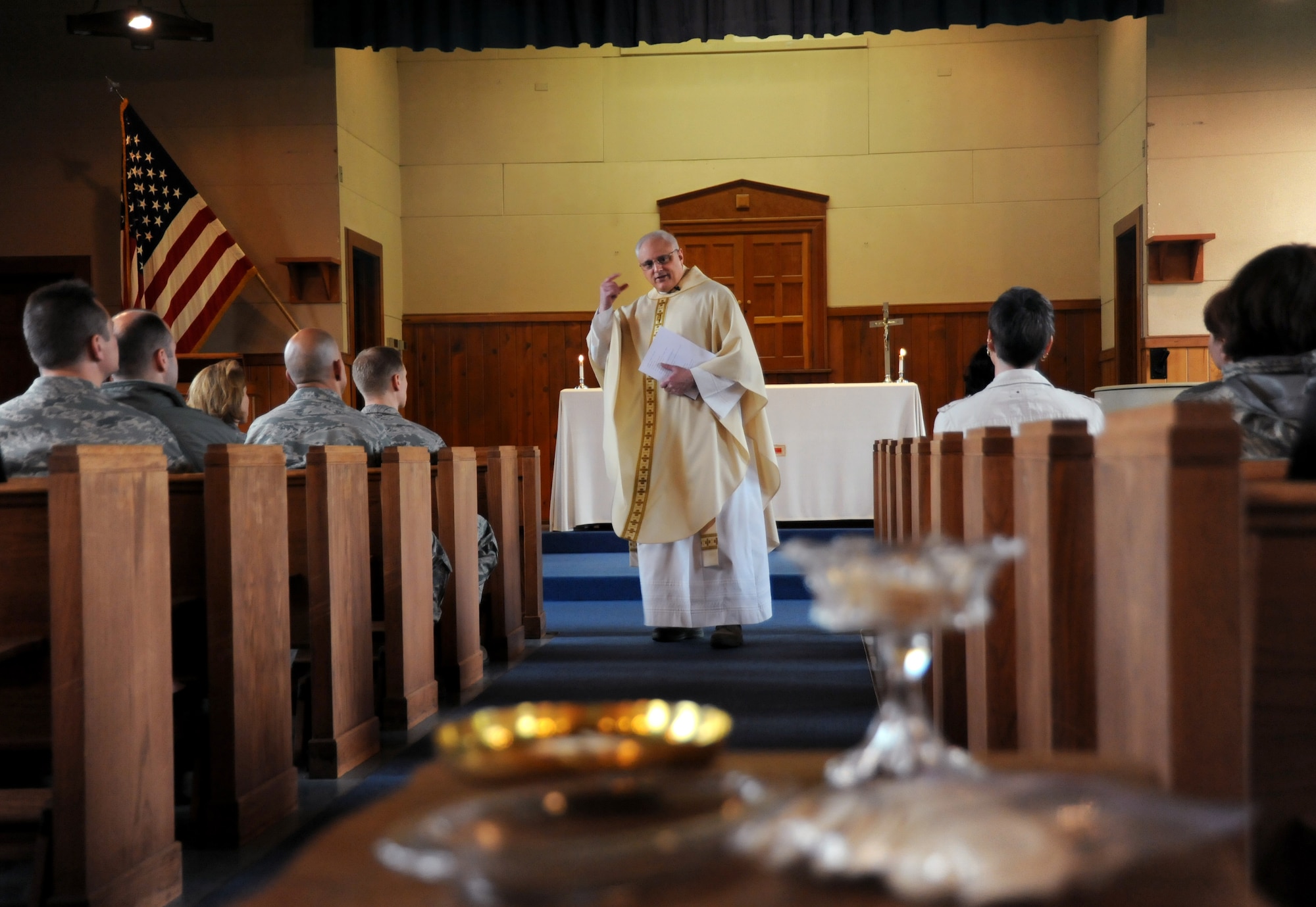 Air Force Lt. Col. Rick Sirianni delivers the Homily during mass held on May 15, 2011 at the Portland Air National Guard Base, Portland, Ore., during the 142nd Fighter Wing Unit Training Assembly. This was Father Sirianni's last mass before he retires from the Oregon Air National Guard after 23 years of service. (U.S. Air Force photograph by Tech. Sgt. John Hughel) (Released)