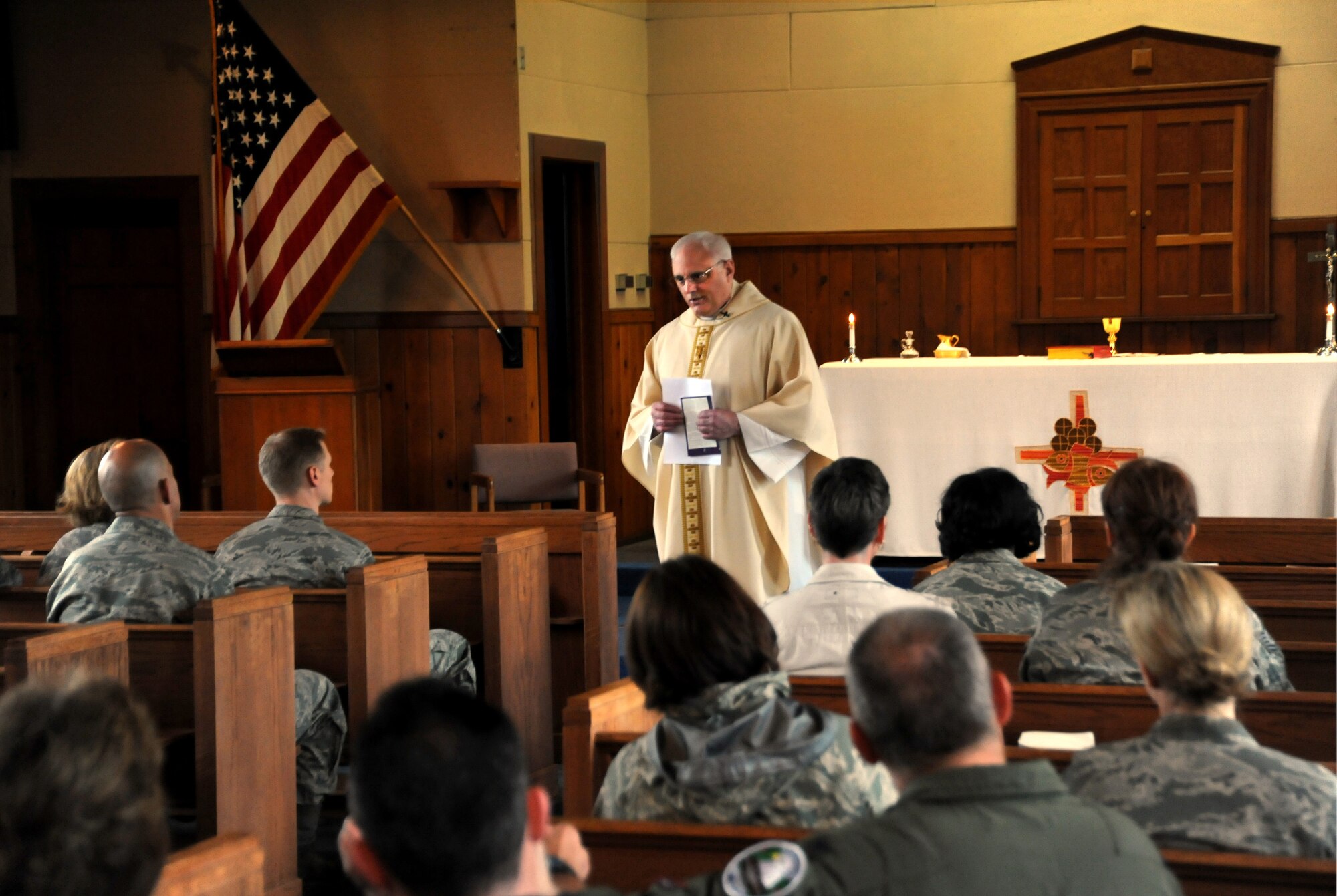 Air Force Lt. Col. Rick Sirianni delivers the Homily during mass held on May 15, 2011 at the Portland Air National Guard Base, Portland, Ore., during the 142nd Fighter Wing Unit Training Assembly. This was Father Sirianni's last mass before he retires from the Oregon Air National Guard after 23 years of service. (U.S. Air Force photograph by Tech. Sgt. John Hughel) (Released)