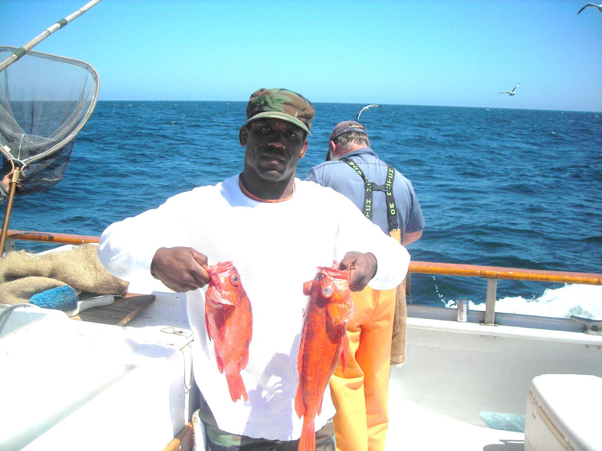 Master Sgt. Christopher Easter, Operational Test and Evaluation Center Det. 5, holds up his catch for the day during a deep-sea fishing trip near Anacapa Island May 26. (Courtesy photo by William (Jeff)Arnett)