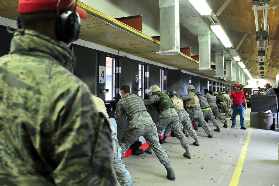 MINOT AIR FORCE BASE, N.D. – Airmen fire M-16A2s during the Air Force Qualification Course at the Combat Arms Training and Maintenance firing range here June 7. Airmen tasked to deploy, train to ensure proficiency with combat firearms. (U.S. Air Force Photo/Senior Airman Jesse Lopez)

