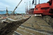 MINOT AIR FORCE BASE, N.D. – Construction of the new dormitory is well underway in the insulation process here June 07 here. Construction to help foster a better quality of life for Air Force Global Strike Command Airman began early March and projected to finish by May. (U.S. Air Force Photo/Senior Airman Jesse Lopez)