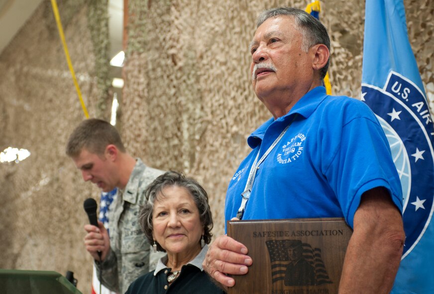 MOODY AIR FORCE BASE, Ga. -- Retired Senior Master Sgt. Pete Villarreal, former 822nd Combat Security Police Squadron NCO in charge of Charlie Flight heavy weapons and Safeside Association vice president, receives the Sgt. Maj. Robert Frink award. Chief Master Sgt. Robert Frink is an iconic figure from the 82nd Combat Security Police Wing who served in World War II, Korea and Vietnam. He survived an execution attempt in World War II, which earned him the purple heart. (U.S. Air Force photo/Airman 1st Class Jarrod Grammel)(RELEASED)