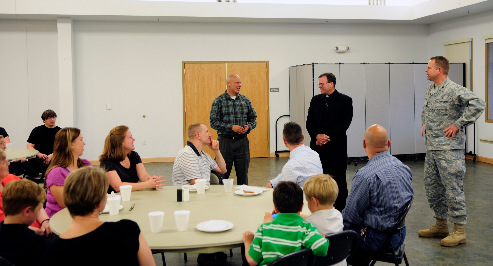 Bishop Neal Buckon speaks at the Chapel Fellowship Hall June 3, 2011, Eielson Air Force Base, Alaska.  Eielson's religious community and Fort Wainwright guests gathered to meet and greet the bishop at a Fellowship Dinner. Bishop Buckon is the Auxiliary Bishop for Archdiocese for the Military Services, USA. (U.S. Air Force photo/Airman 1st Class Yash Rojas)