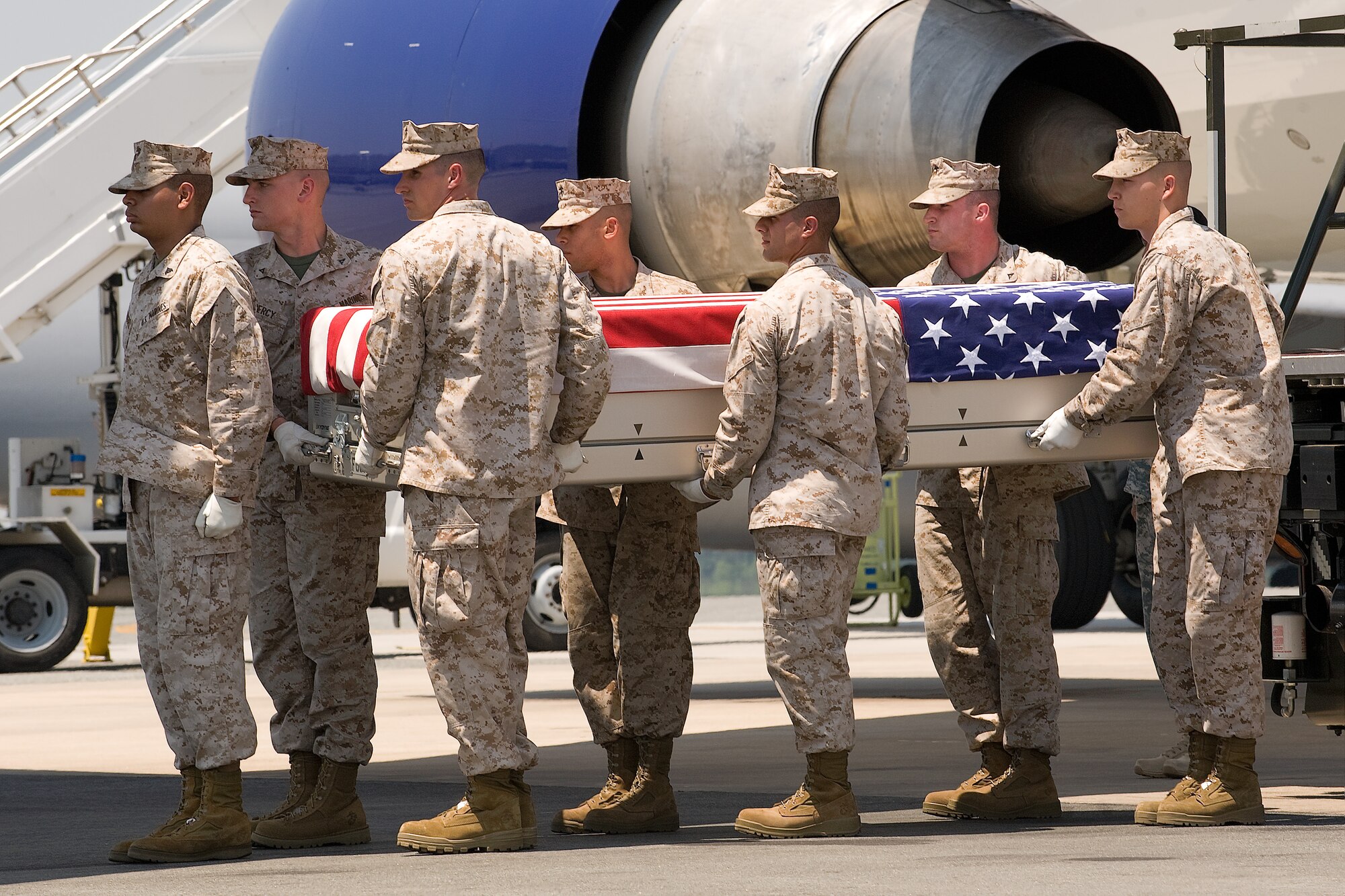 A U.S. Marine Corps carry team transfers the remains of Marine Sgt. Joseph M. Garrison, of New Bethlehem, Pa., at Dover Air Force Base, Del., June 8, 2011. Garrison was assigned to the 2nd Battalion, 2nd Marine Division, II Marine Expeditionary Force, Camp Lejeune, N.C. (U.S. Air Force photo/Steve Kotecki)