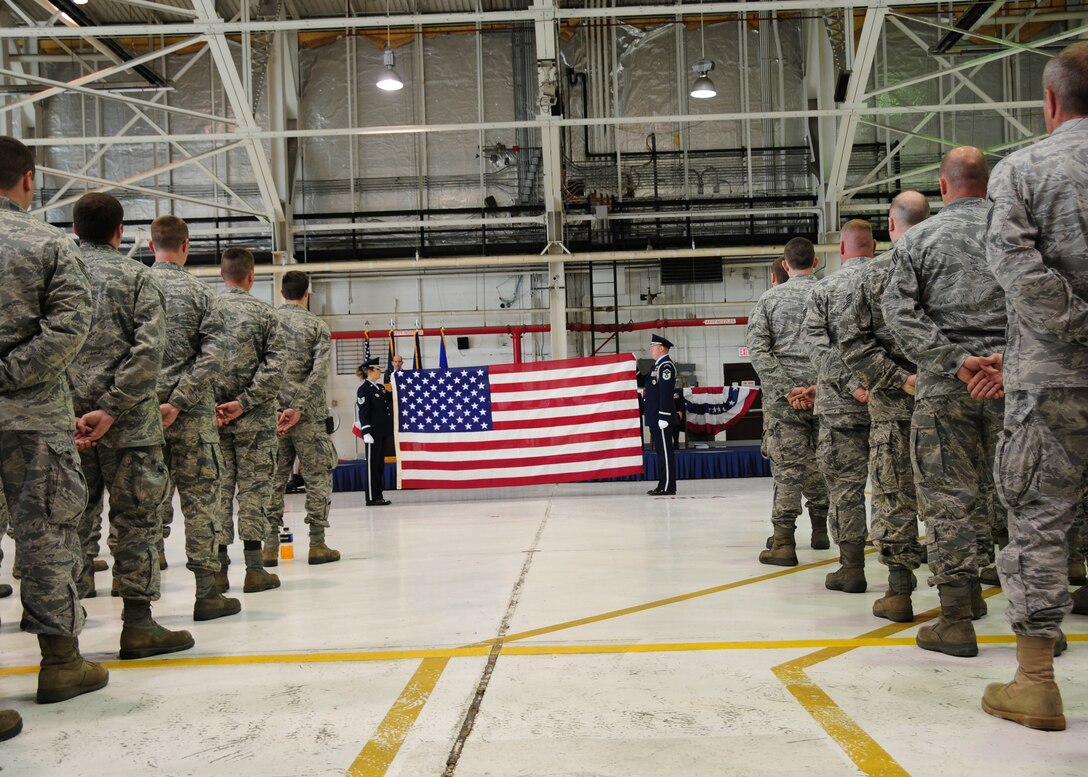 914th Airlift Wing Vice Commander Col. Mark P. Murphy is presented with an American flag, June 4, 2011, Niagara Falls Air Reserve Station, NY. The flag was presented to Colonel Murphy during his retirement ceremony. (U.S. Air Force photo by Senior Airman Jessica Snow)