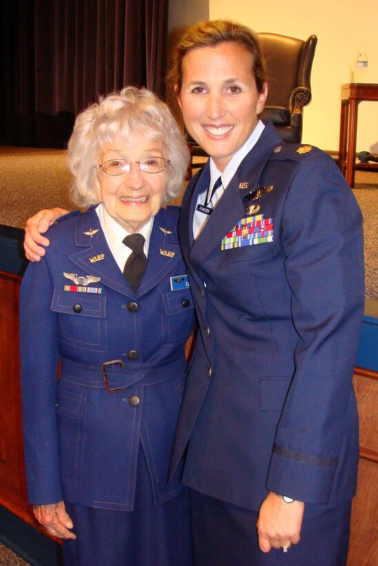 Maj. Lori Rasmussen, an RC-135 pilot assigned to 1st Air Force, stands with Violet Cowden, a pilot with the Women Airforce Service Pilots – or WASPs, before an event at Maxwell Air Force Base, Ala. The women became friends nearly two years ago when Major Rasmussen was assigned to a team devoted to honoring heroes who demonstrated excellence in air power. The major spoke at Ms. Cowden’s memorial service in Chino, Calif., May 21. (Courtesy photo)