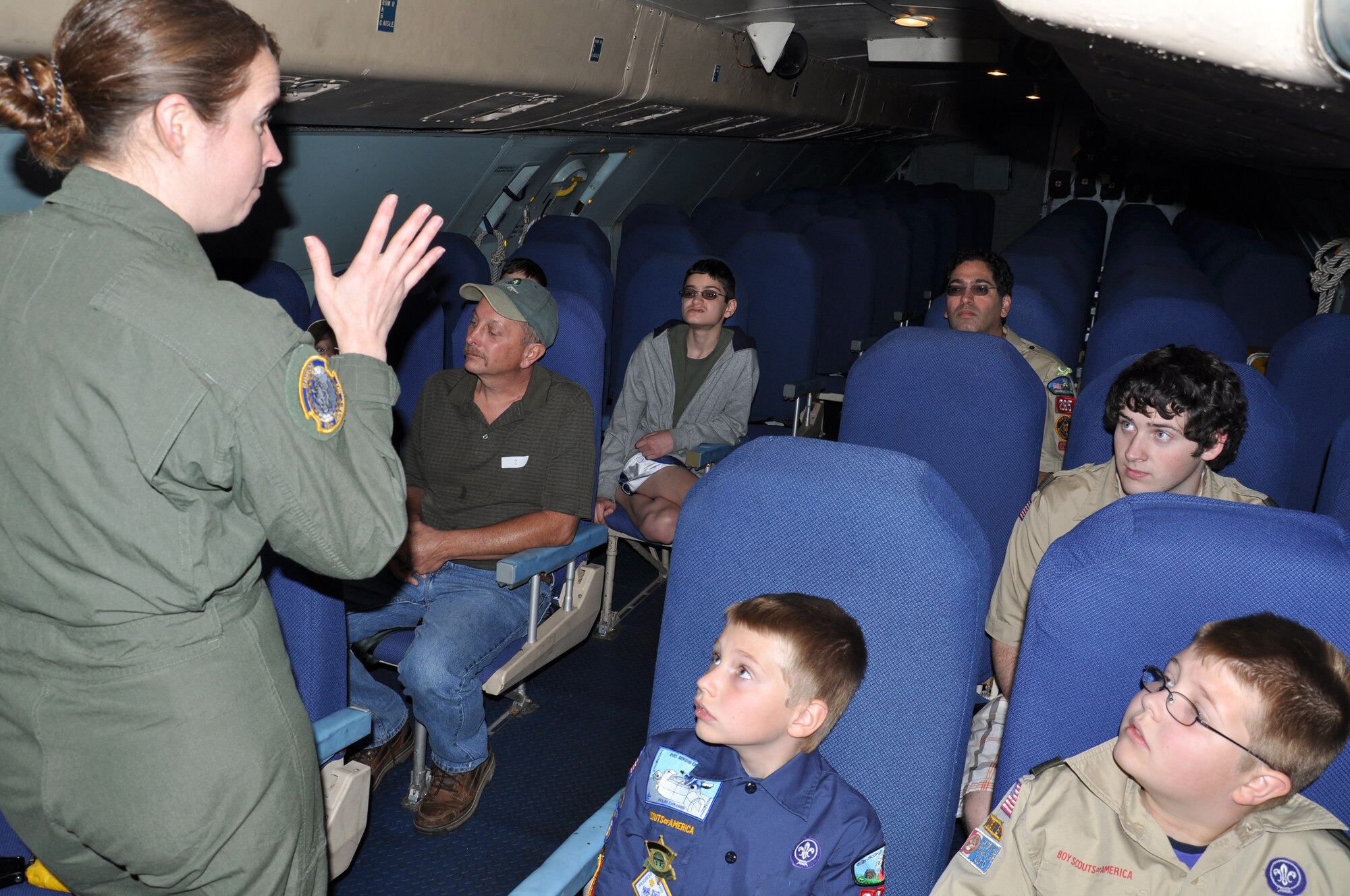 WRIGHT-PATTERSON AIR FORCE BASE, Ohio – Tech. Sgt. Caroline Sussman, 89th Airlift Squadron, loadmaster, explains the role of the C-5 Galaxy aircraft troop compartment to a group of Scouts during the 445th Airlift Wing’s Scout Day May 21.  Scouts day provides an opportunity for Boy and Girl Scout troops to come and experience what the Air Force does. (U.S. Air Force photos/Tech. Sgt. Anthony Springer)