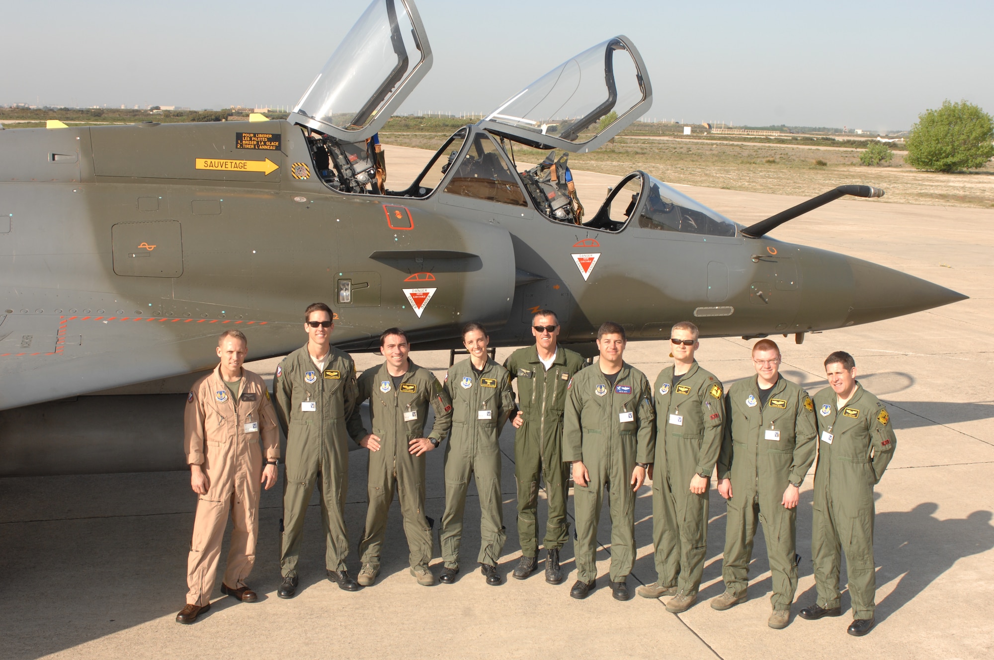 Members of the United States Air Force Test Pilot School Class 10B pose in front of a French Air Force Mirage 2000. The students flew in a variety of aircraft, both foreign and domestic, as part of their curriculum. Twenty-four students will graduate June 11, and receive a Master of Science degree in Flight Test Engineering. (Air Force photo)