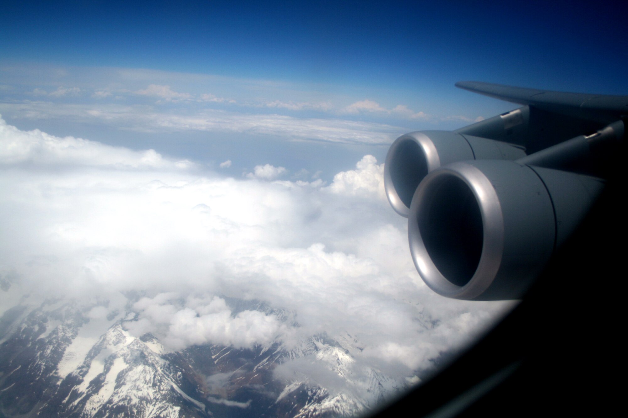 Thne countryside of Afghanistan can be seen through the window of a C-5M Super Galaxy during an airlift mission on June 7, 2011.  (U.S. Air Force Photo/Master Sgt. Scott T. Sturkol)