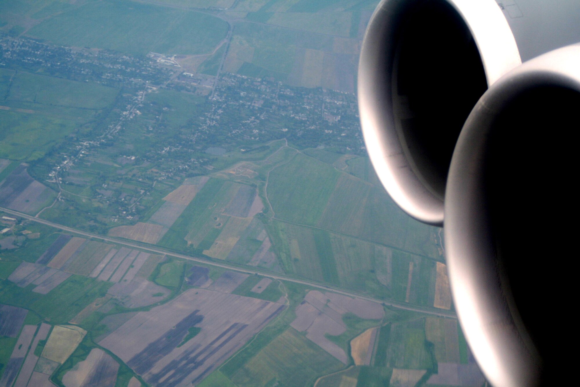 Thne countryside of Kygyzstan can be seen through the window of a C-5M Super Galaxy during an airlift mission on June 7, 2011.  (U.S. Air Force Photo/Master Sgt. Scott T. Sturkol)