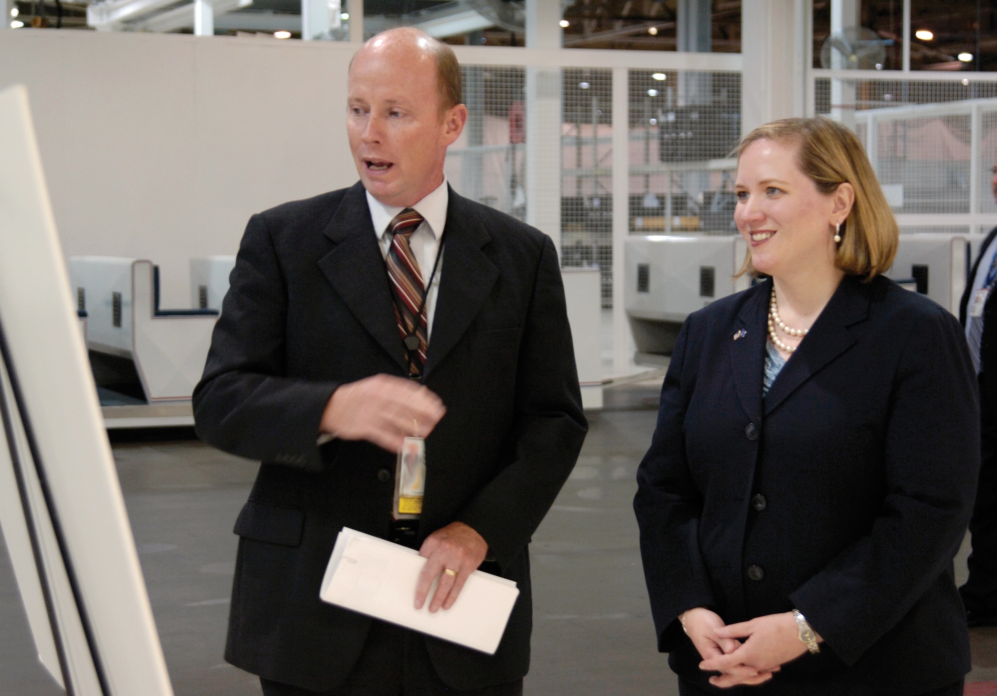 Darrel Anderson, 76th Maintenance Support Group’s Tinker Aerospace Complex program manager, briefs Under Secretary of the Air Force Erin Conaton on the capabilities of the Tinker Aerospace Complex, June 6, 2011, at Tinker Air Force Base, Okla.  The building and the surrounding facilities were brainstormed in February 2006 when the General Motors plant in southeast Oklahoma City unexpectedly closed.  In 2008, Oklahoma County purchased the facility from GM and leased it to the Air Force.  The under secretary visited Tinker Air Force Base, June 5-6, 2011, to meet with base and community officials and see first-hand the base’s efforts to support warfighter needs.  (U.S. Air Force Photo/Margo Wright)
